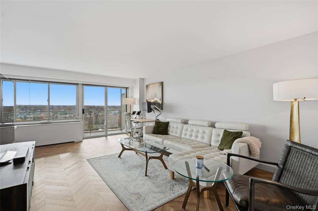 Enjoy breathtaking, unobstructed water views from this fully renovated, sun filled 14th floor home in The Seville building at Towers at Waters Edge.