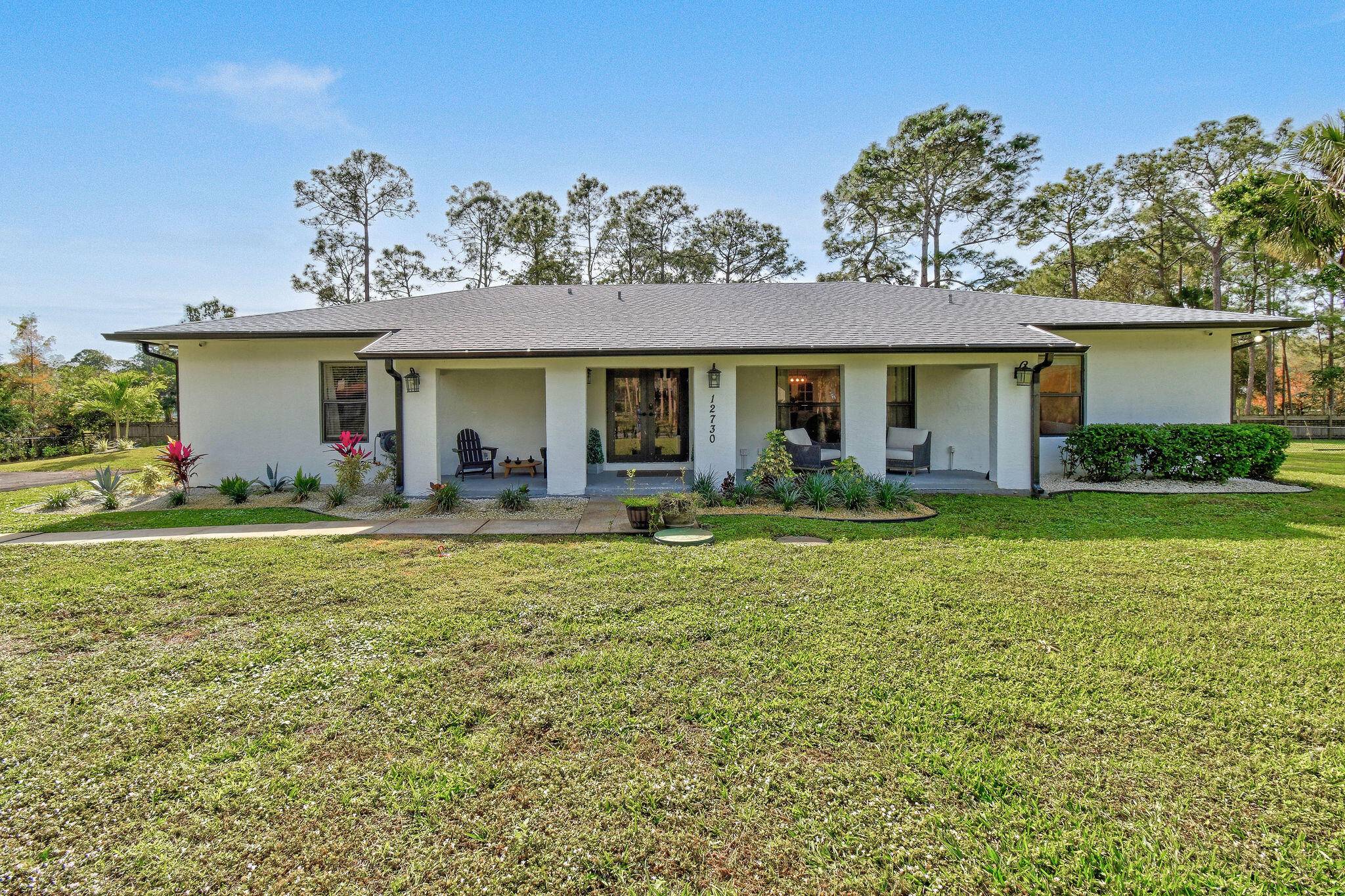 Modern farmhouse ranch style home on 1.
