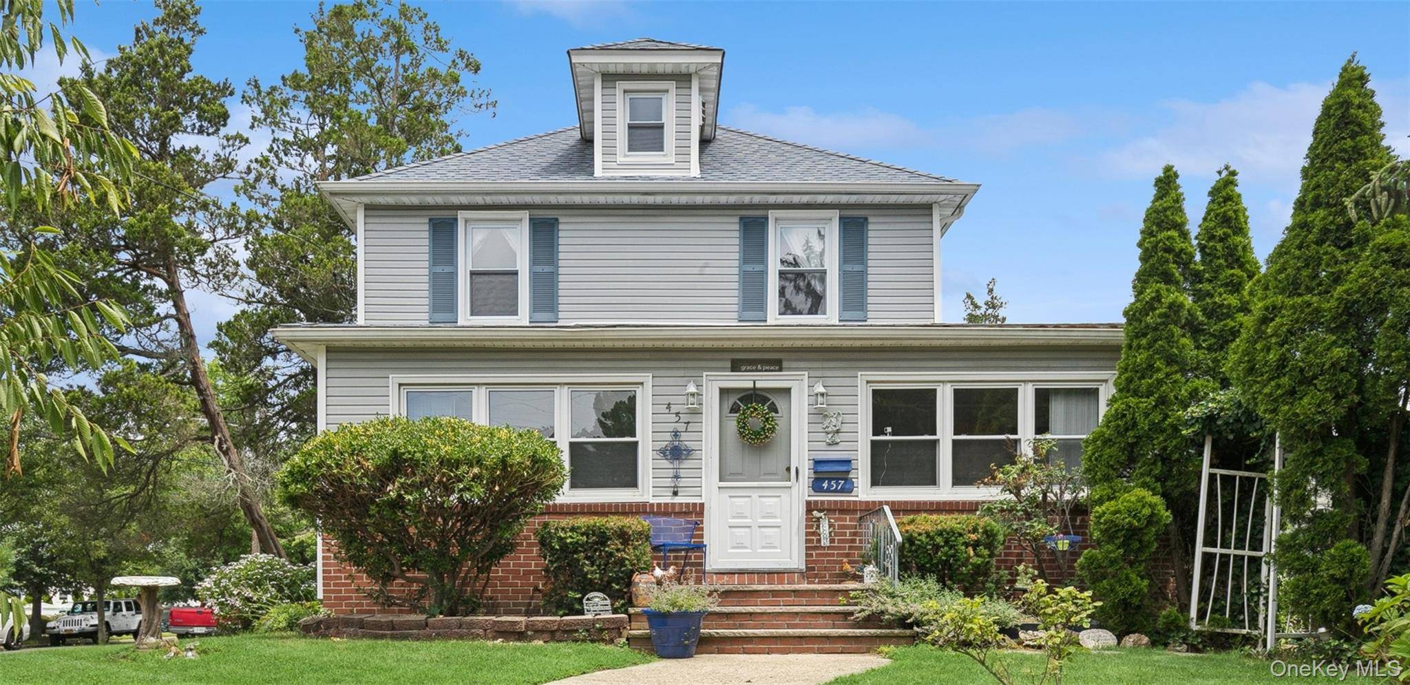 Minutes Away From Farmingdale Village Main Street, This Grand, Side Hall Colonial Situated on an Immense Corner Lot Offers Over 2, 100 Sq.