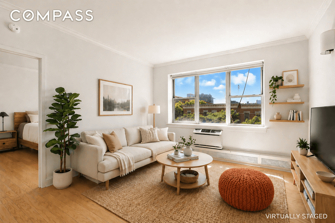 Welcome to this beautifully renovated 2 bedroom, 2 bathroom home with open west facing views and incredible natural light throughout the day.