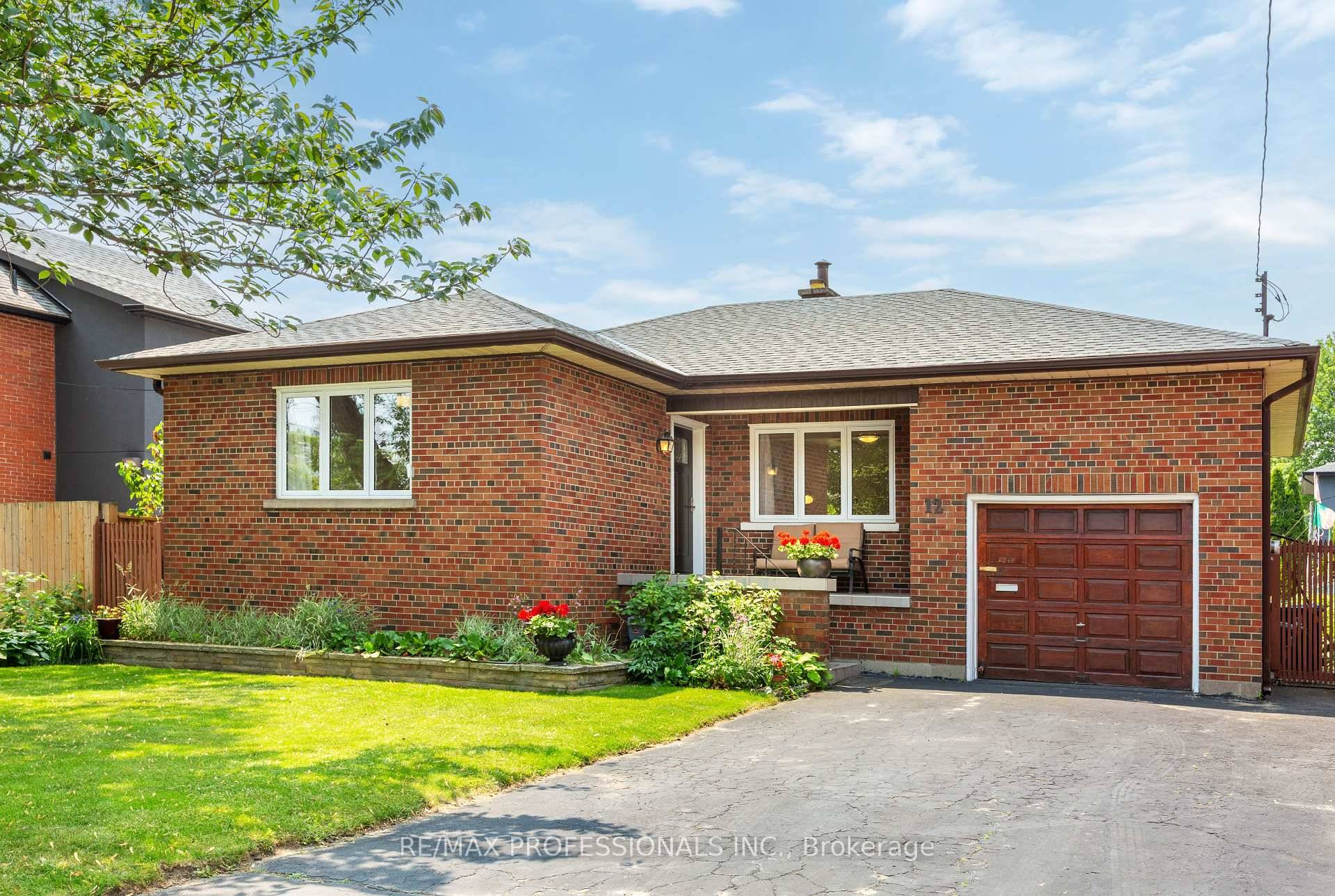Welcome to 12 McIntosh Ave, a solid brick bungalow brimming with potential in the heart of Queensway Village !