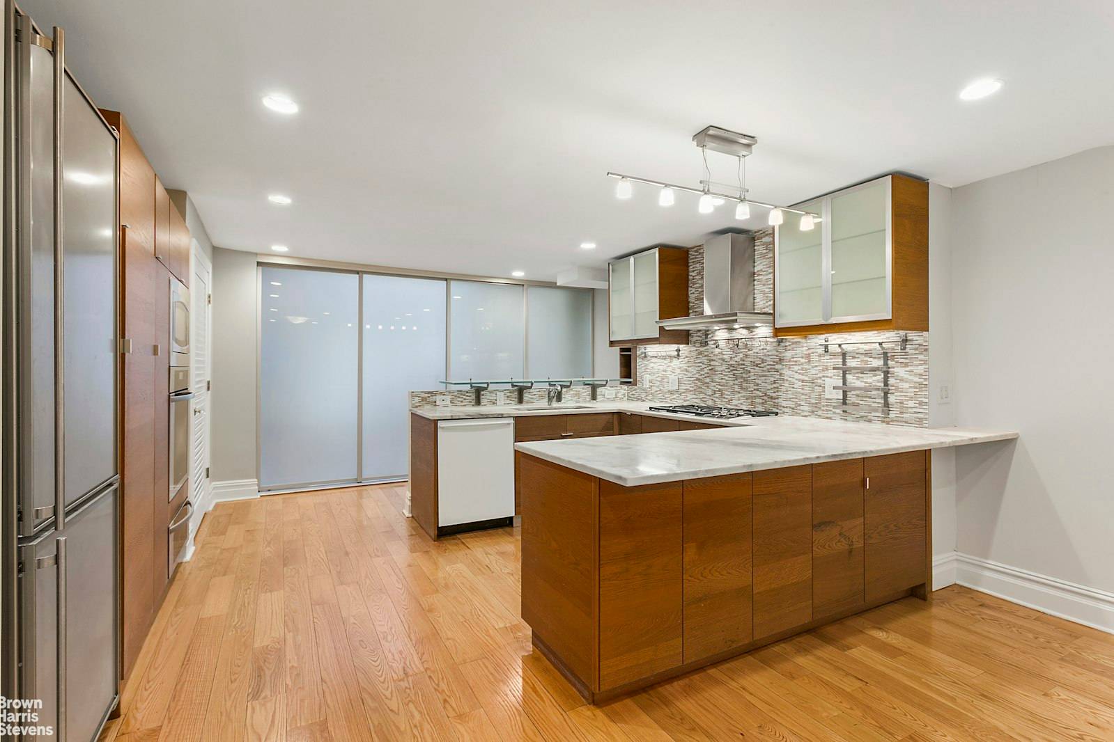 Don't miss this beautifully renovated 2 bedroom, 2 bath garden level apartment in a classic 1845 townhouse.