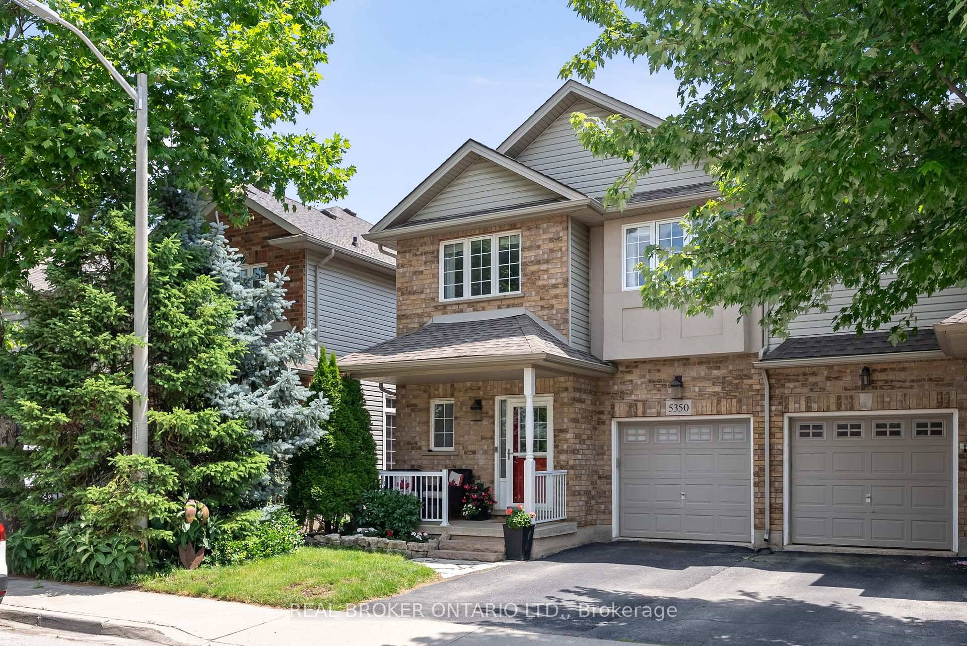 Welcome to this stunning, fully renovated freehold end unit townhome located on a quiet crescent in The Orchard Burlington's most desirable family friendly neighbourhood.