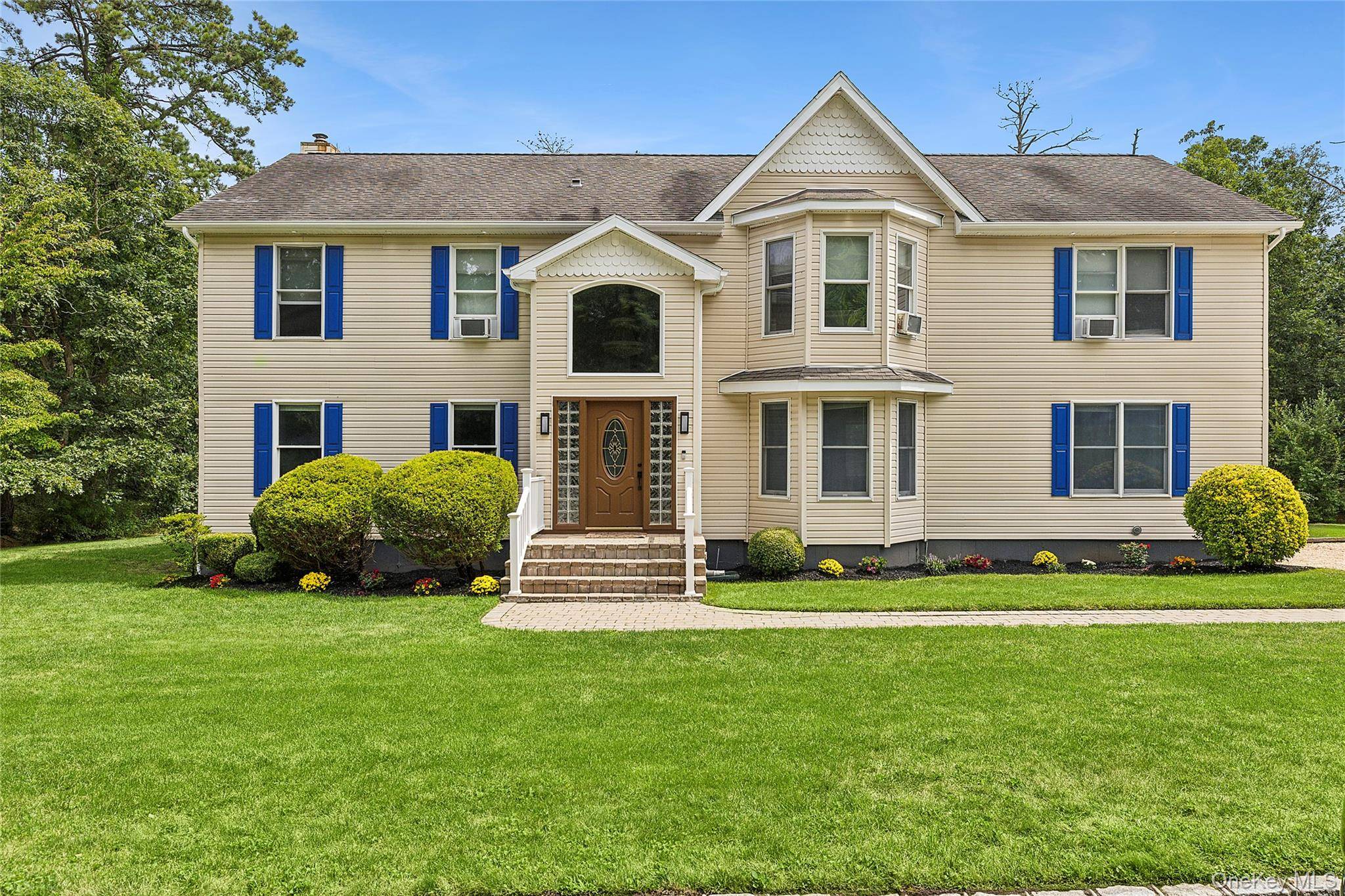 Come home to this spacious Colonial Contemporary Style Home.