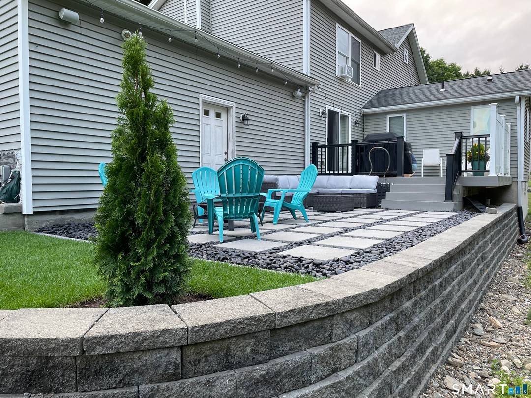 Welcome to this Charming Colonial style home on corner lot with 1.