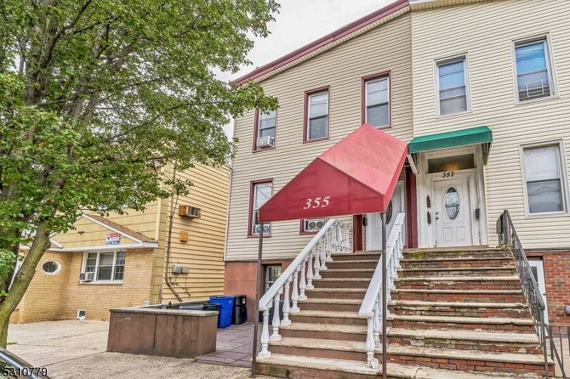 Welcome to your new home at 355 Liberty Ave, a semi attached duplex featuring apartment 1 with a spacious 3 bedroom, 1.
