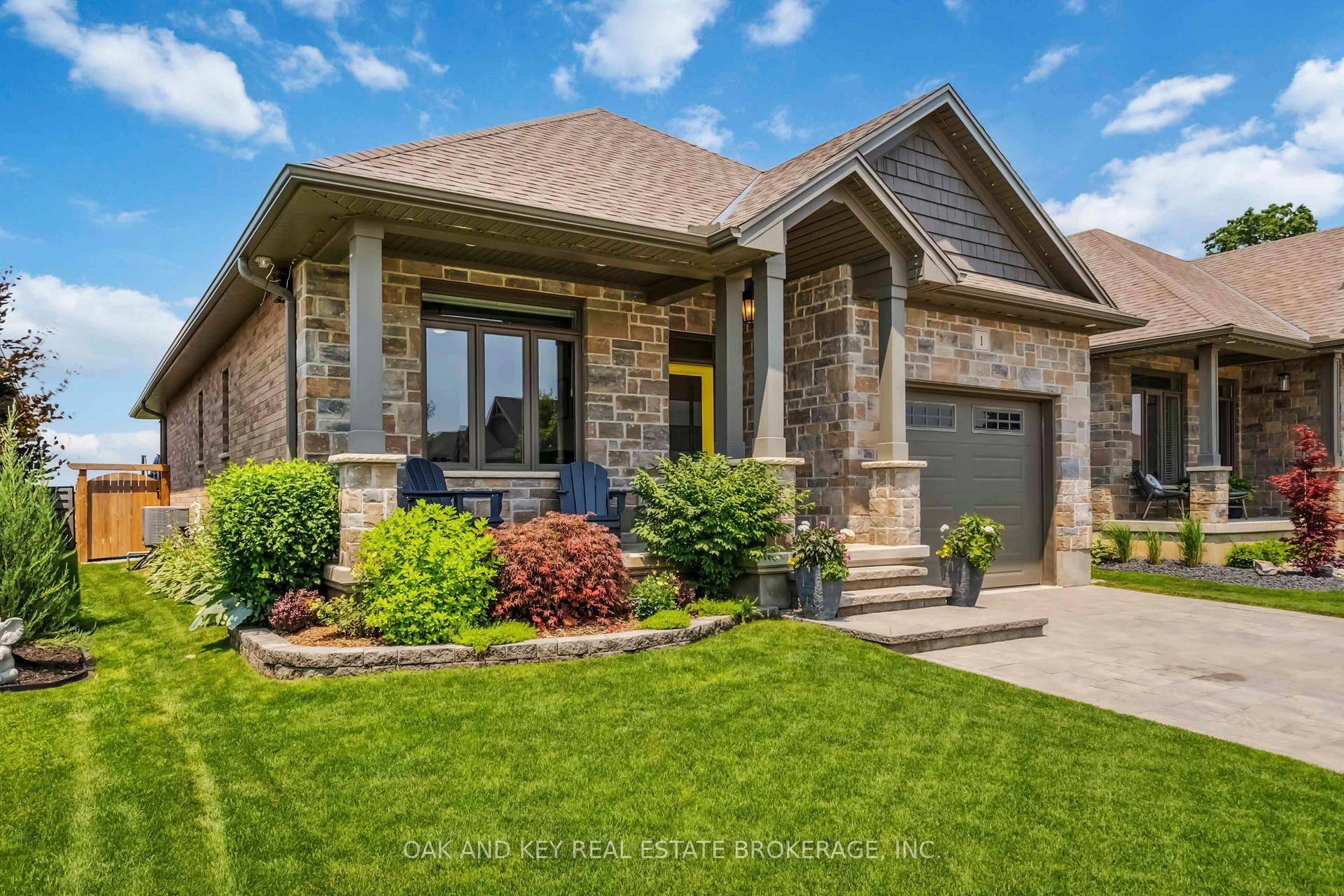 Welcome to Unit 1 at 159 Collins Way, nestled in the charming town of Strathroy.