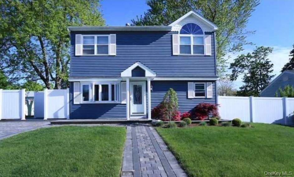 Colonial home in Central Islip, blending comfort and convenience.