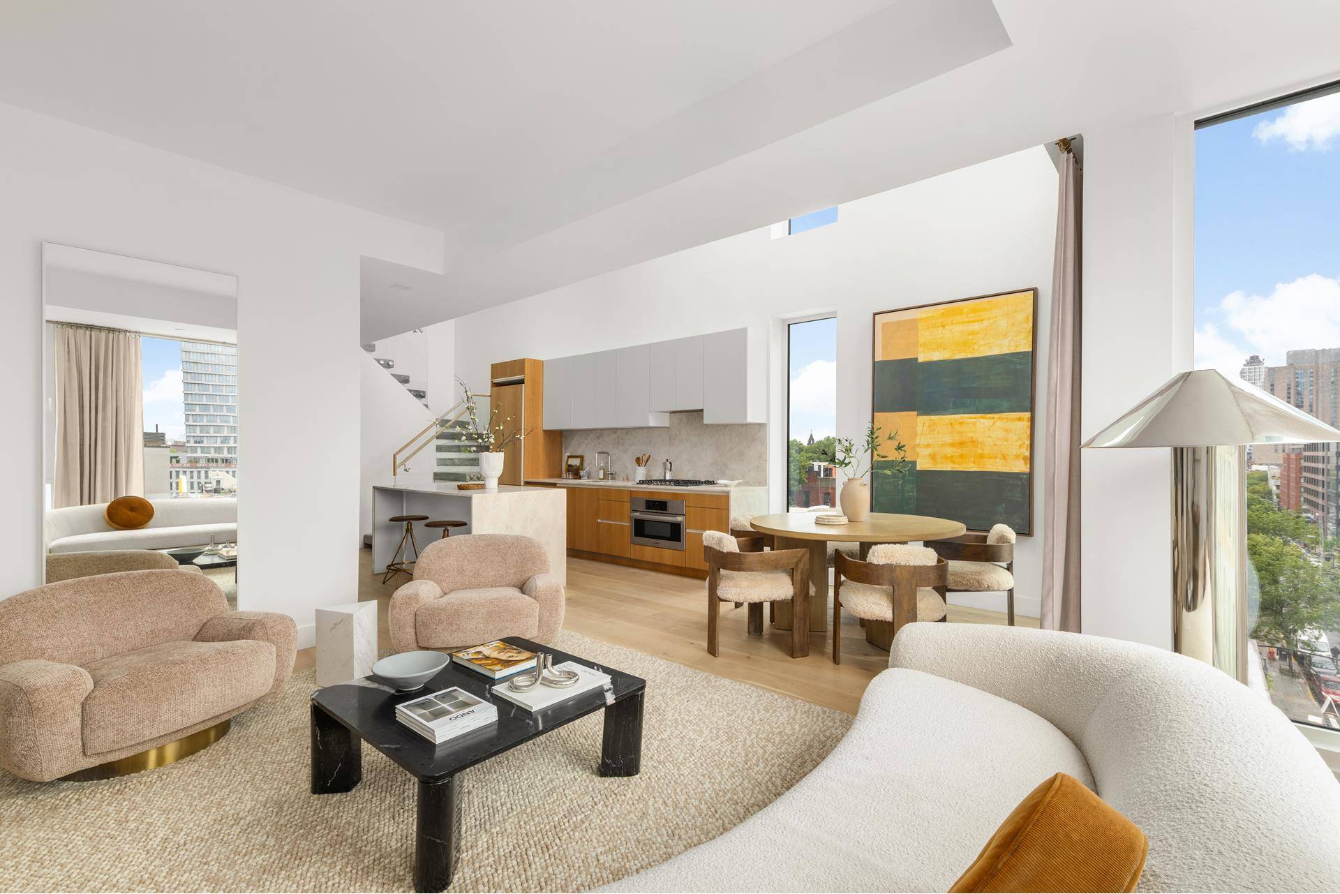 Perched atop a newly constructed boutique condo, this stunning 3 bedroom, 2 bathroom duplex penthouse redefines modern luxury living boasting over 1100 square feet of outdoor space.