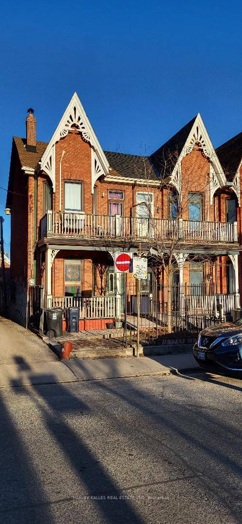 The ideal Victorian Semi in the literal Heart of Little Italy's Clinton Street.