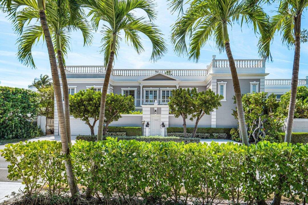 Sited within the Presidential Security Zone just two streets north of Mar a Lago, this elegant John Volk designed Regency home offers timeless Palm Beach appeal with private deeded beach ...