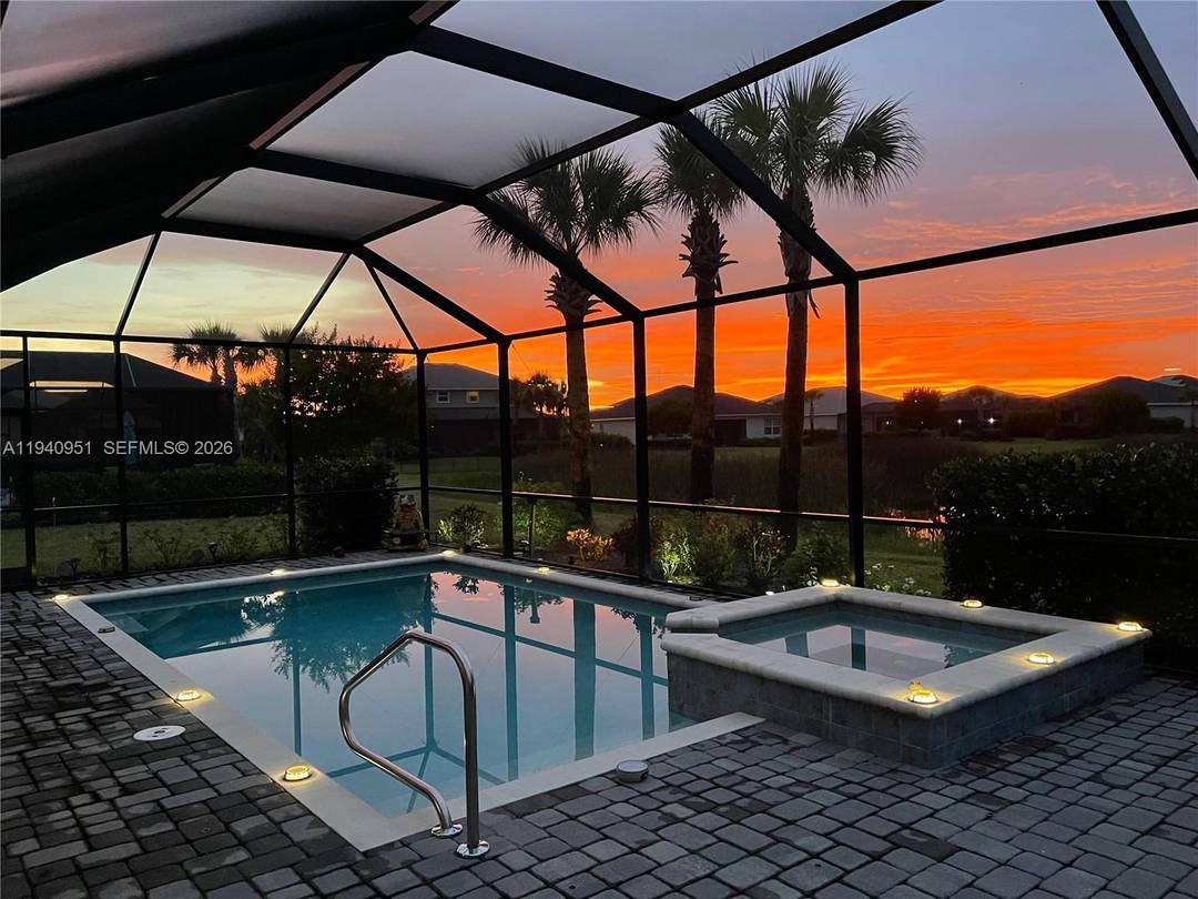 Lake view Majestica in Trails Edge at BABCOCK RANCH IN PUNTA GORDA, FL solar powered community designed for multigenerational living with 5BR 4.