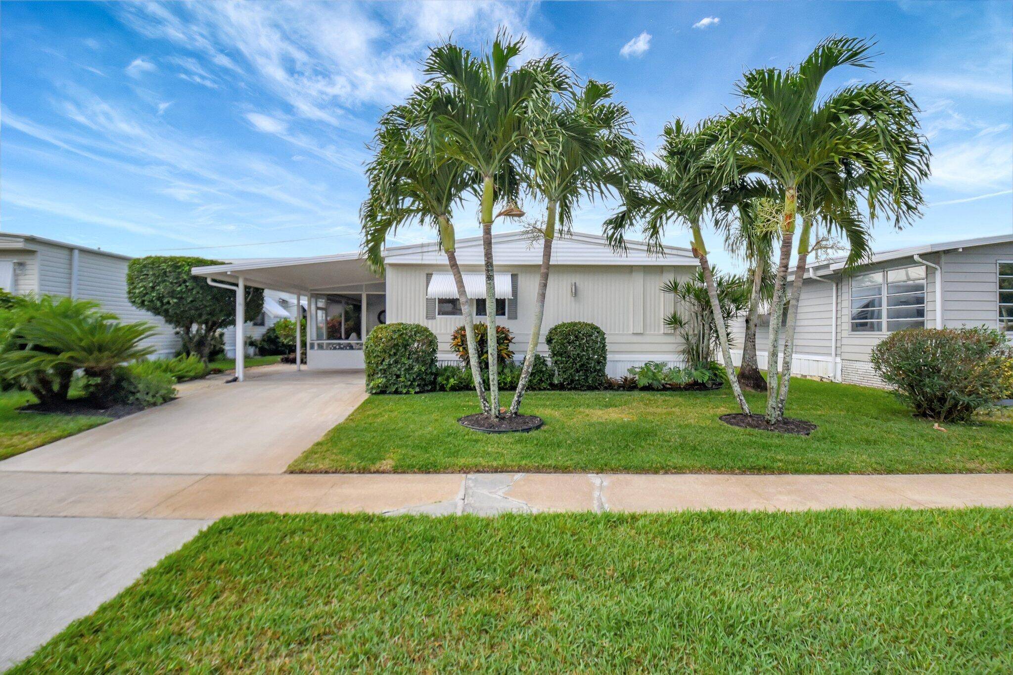 Turn Key Tropical Retreat in 55 Community You OWN the Land !