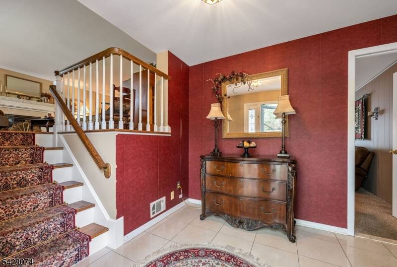 Tucked away on a quiet cul de sac in desirable Wyckoff, this beautifully maintained split level home offers 3, 096 square feet of thoughtfully designed living space.