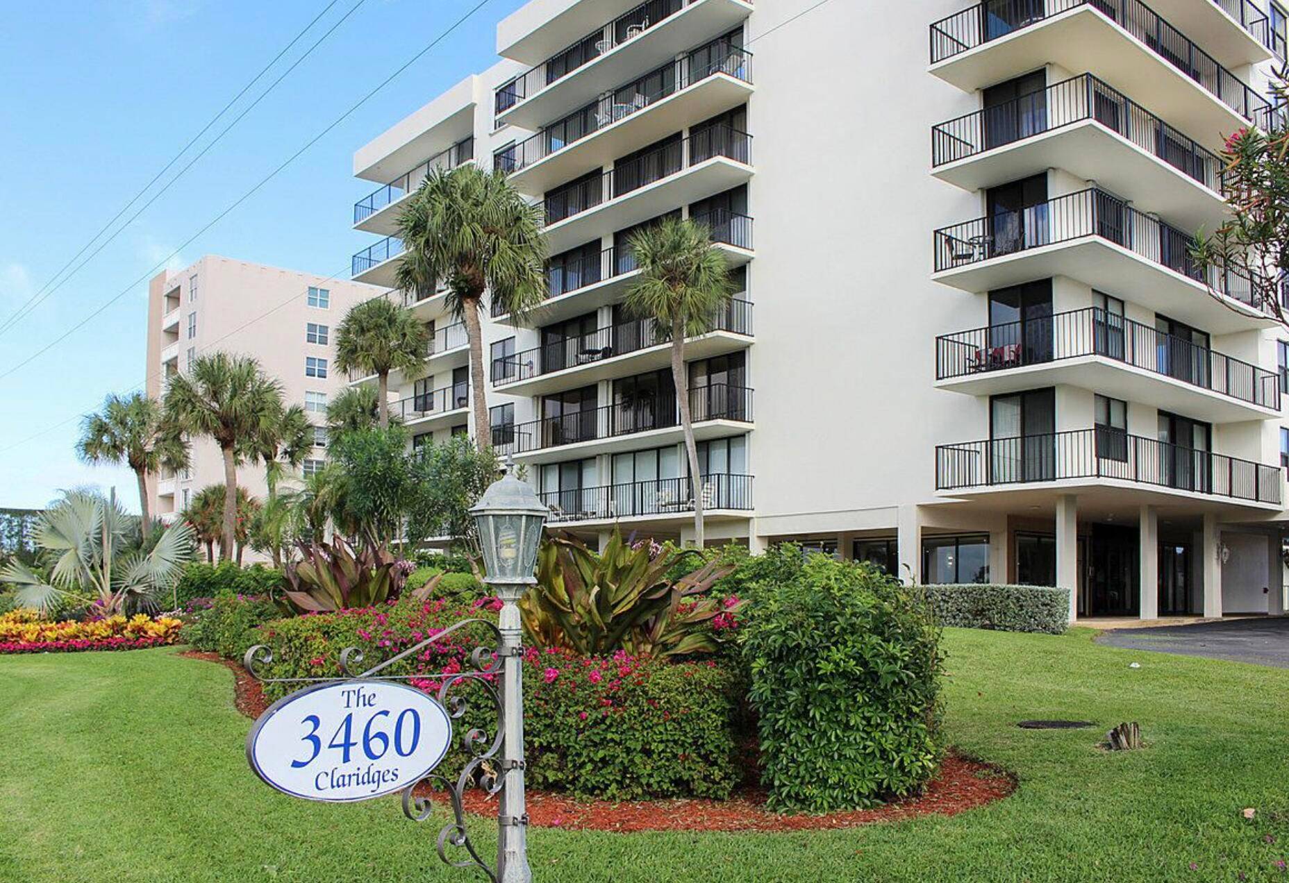 This fully furnished turn key bright and light condo in Highly Desirable Claridges building impresses with a wraparound balcony with views of both the intracoastal and the ocean.