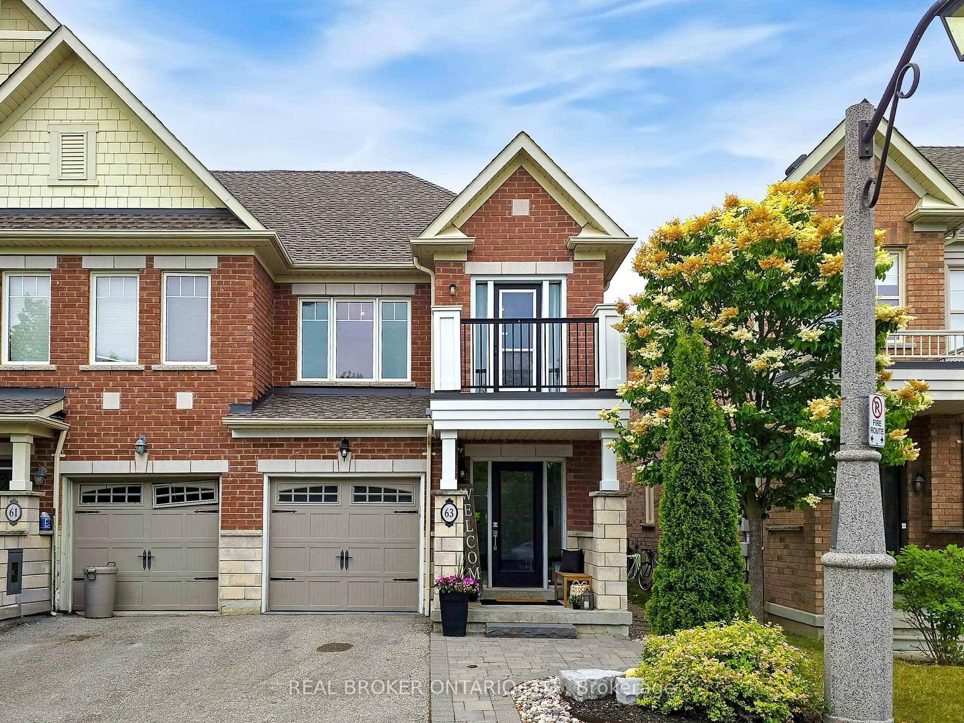 This beautifully upgraded end unit townhome checks all the boxes !