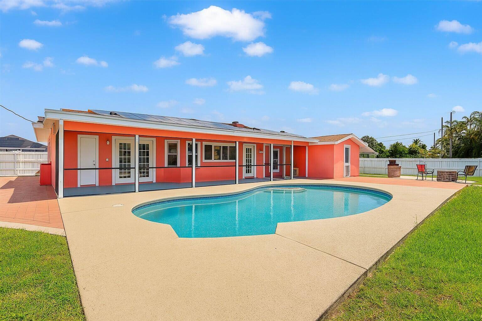 POOL HOME PAID OFF Solar Panels for Minimal Electric Bills, NEW A C 2024, NEW Roof 2025, Oversized Corner Lot Beautifully renovated 3 bedroom, 2 bath, 2 car garage home ...