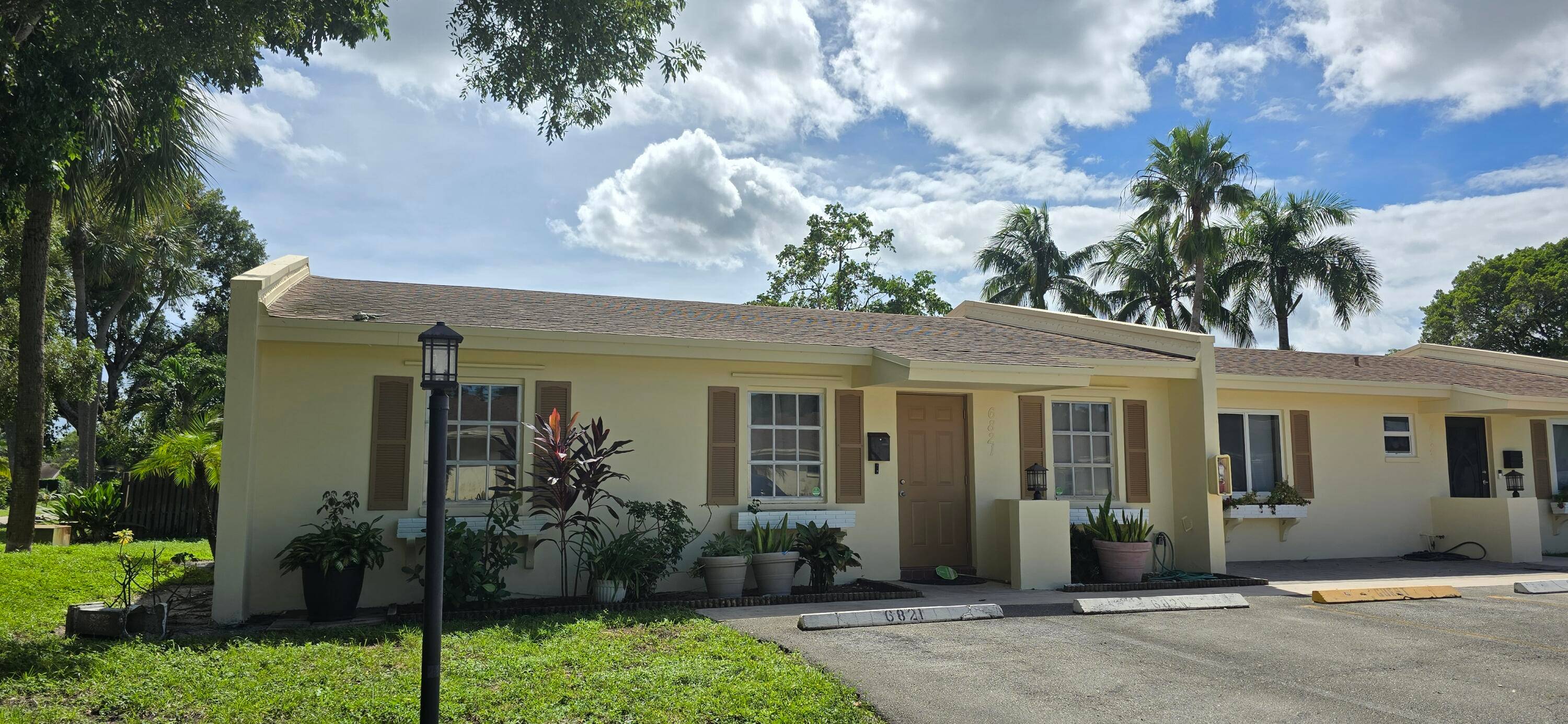 Welcome Home to Your Spacious Villa in The Desirable Palm Aire Village.