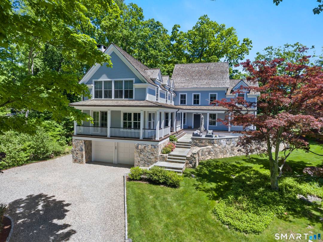 A gorgeous Farmhouse Colonial tucked away on 2 picturesque acres minutes to Fairfield Westport town await.