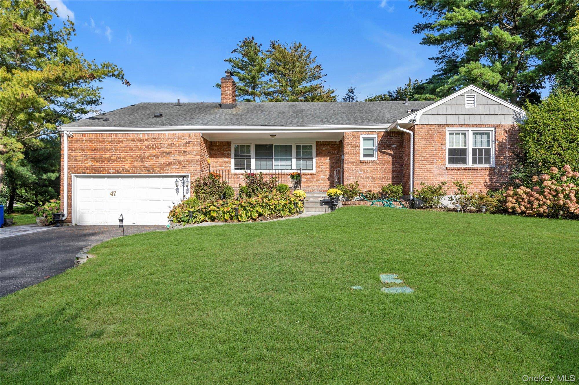 Welcome to your dream home in the prestigious East Hills Country Estate community !