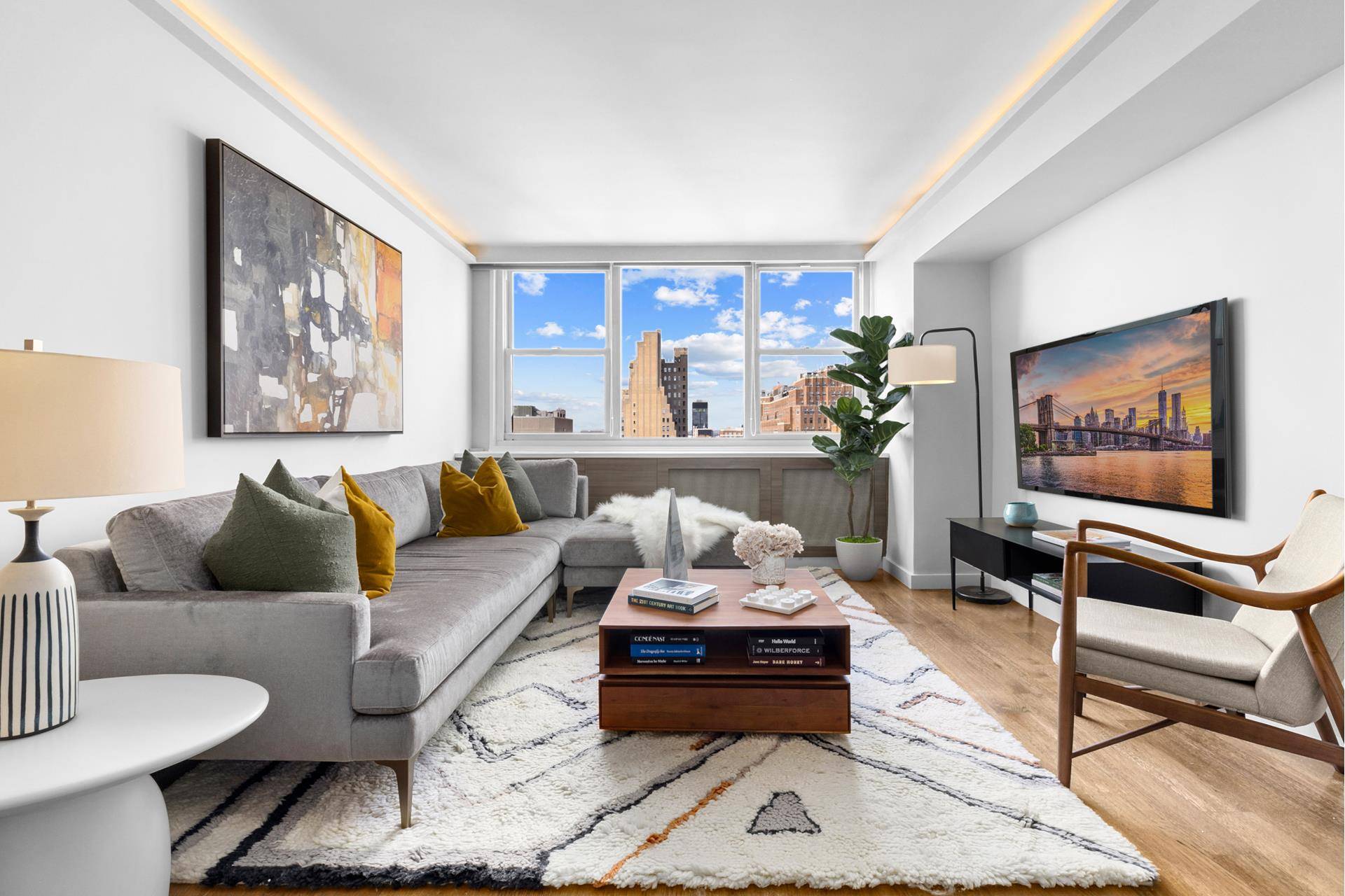 This gracious high floor one bedroom, one bathroom home enjoys wide open views over the West Village, Chelsea, and amazing sunsets over the Hudson River.