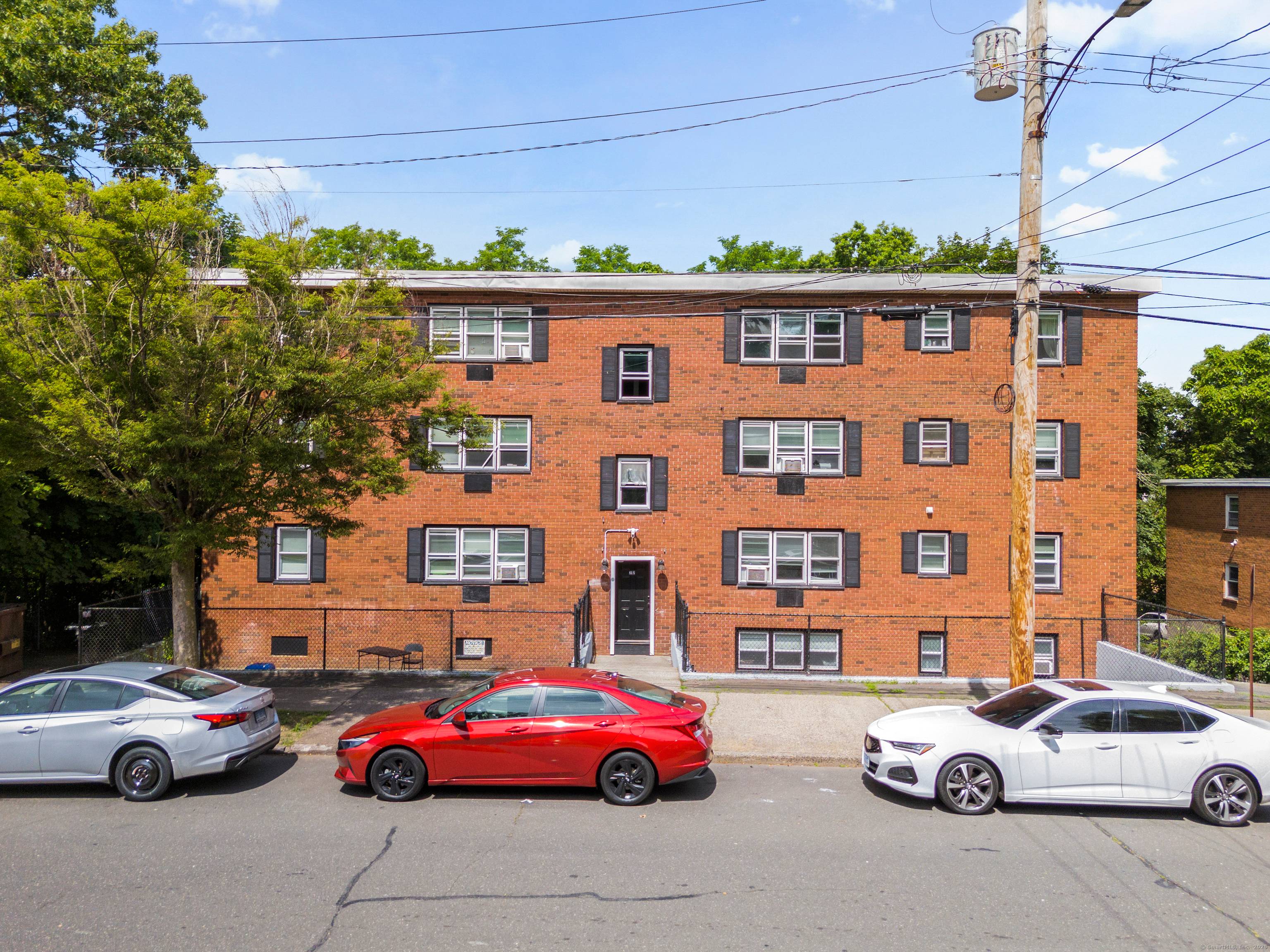 Amazing fully occupied 7 unit brick building two blocks away from Science Park, Albertus Magnus and a short bike ride to Downtown New Haven Yale !