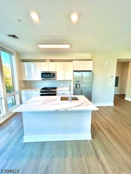 Don't miss out on this TOP FLOOR UNIT !