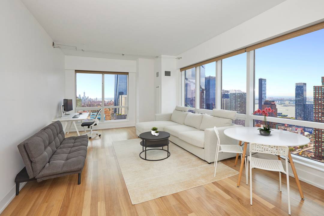 Welcome to luxury living at its finest at 350 West 42nd Street, Unit 41H, a spectacular condo nestled in a chic high rise building that offers breathtaking views of the ...
