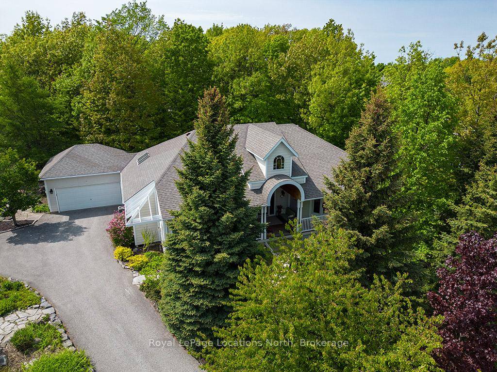 This spacious bungalow resides on a large.