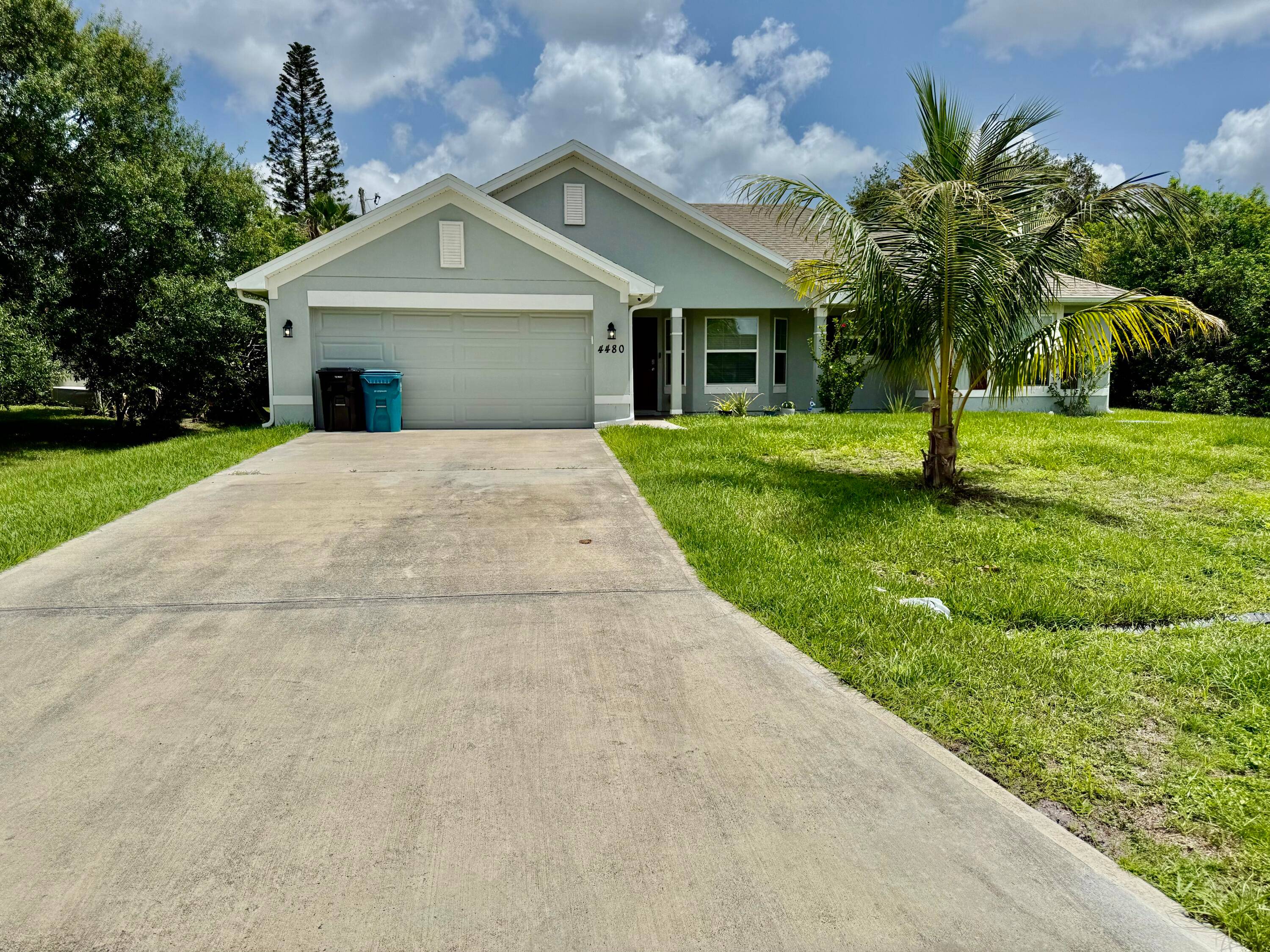 Beautiful 3 Bed, 2 Bath House with 2 Car Garage, single family house located in the prestigious city of Port St.