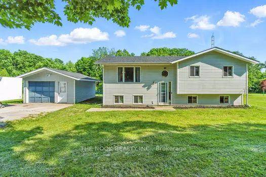 Charming Bungalow with Detached Garage amp ; Finished Basement Tucked away on a beautiful 2 acre lot, this 3 1 bedroom, 3 bathroom home offers the perfect mix of comfort, ...