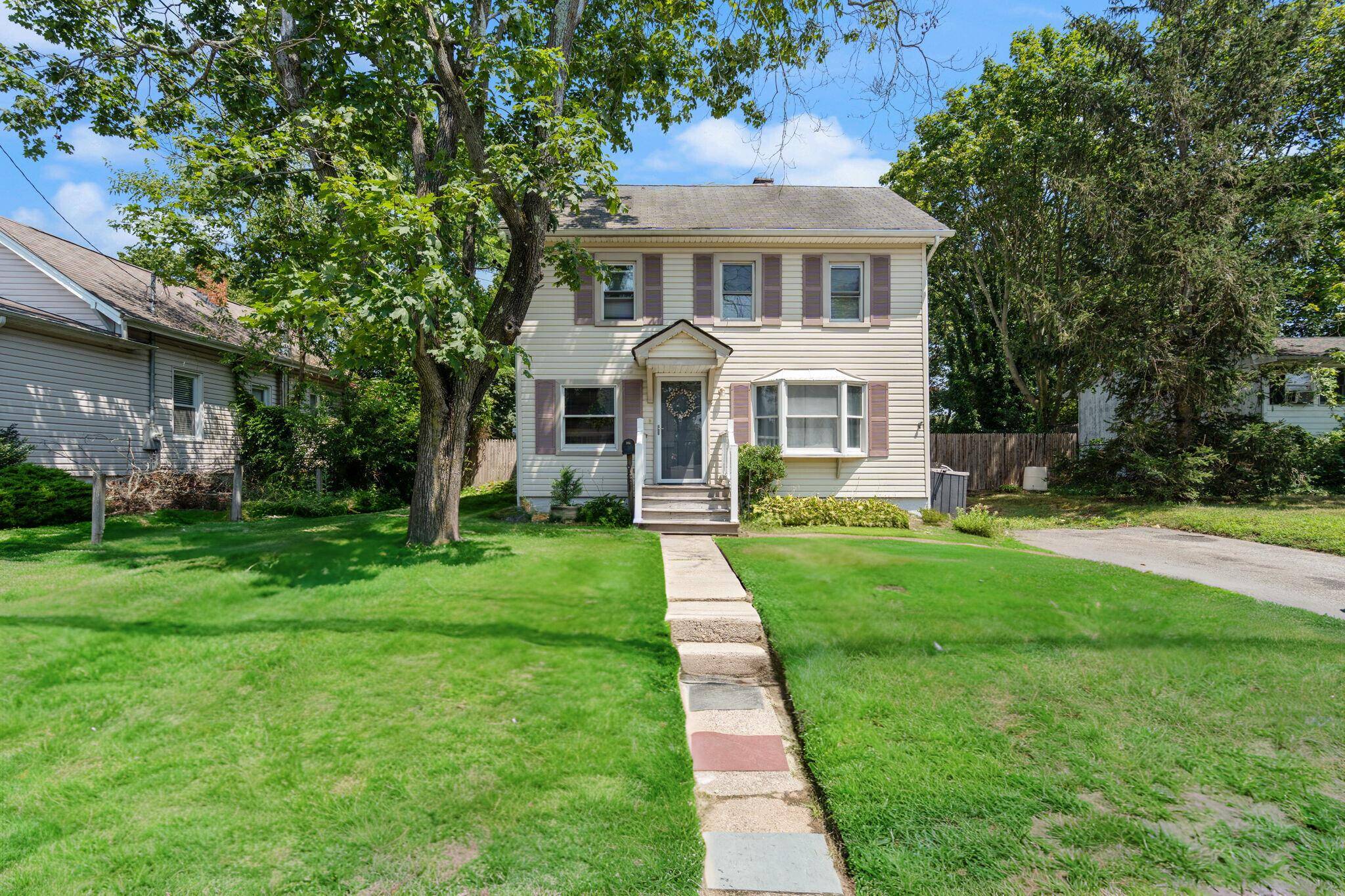 Charming Colonial with SUPER LOW Taxes The Perfect Place to Call Home !