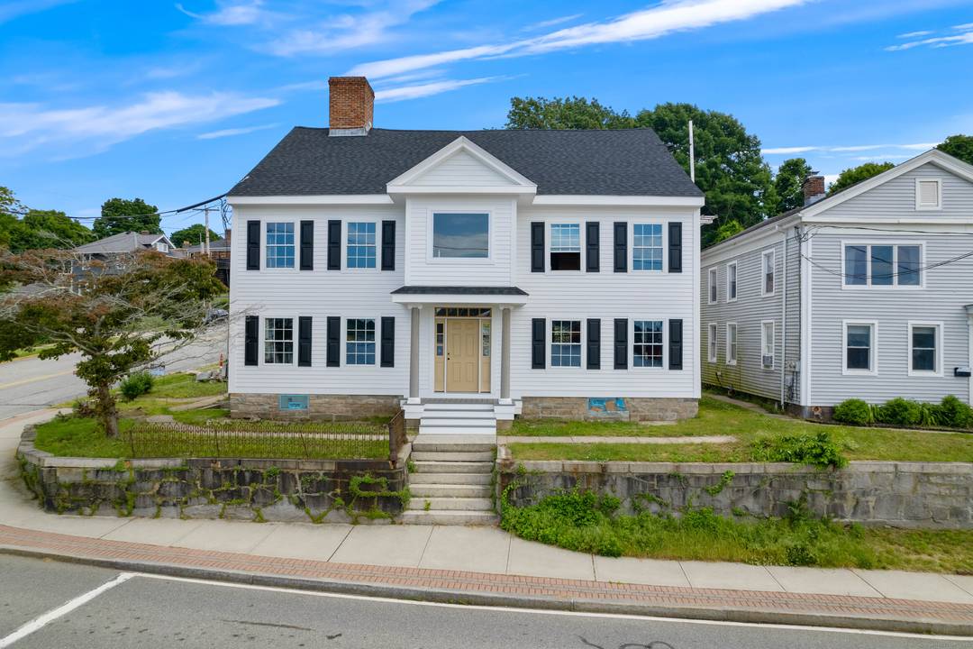 Experience the charm of waterfront living at 108 Thames Street, Groton, CT !