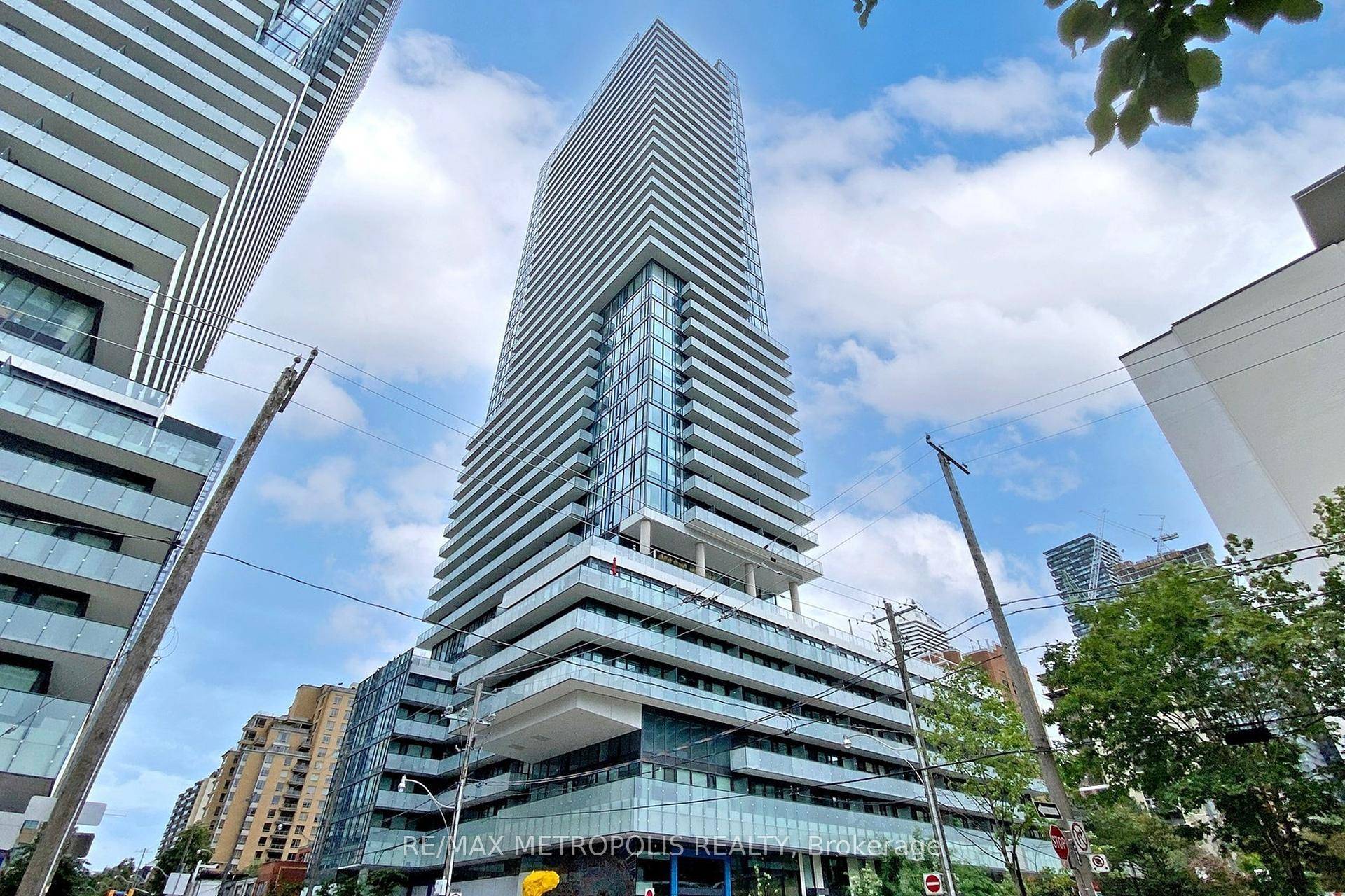 Location, Location ! ! A bright beautiful one bedroom corner unit with open balcony, Large windows, ensuite laundry.