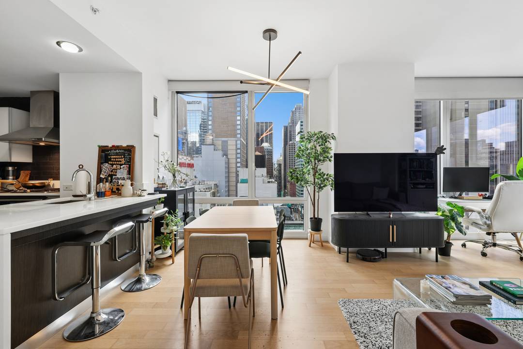 Positioned on the 22nd floor, Residence 2204 is a bright corner one bedroom, one and a half bath home with open city views and a thoughtfully designed layout for both ...