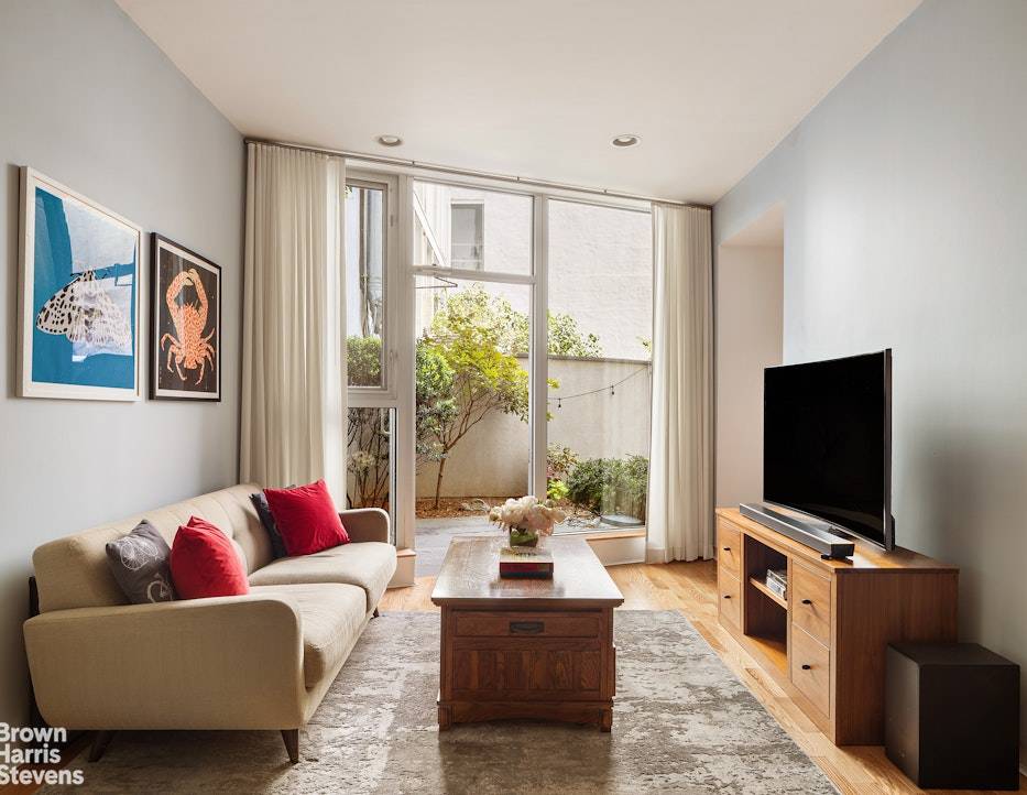 Welcome home to Apartment 1 at 591 Washington Avenue, a thoughtfully designed and extra large one bedroom, one and a half bath condominium that pairs sleek modern finishes with the ...
