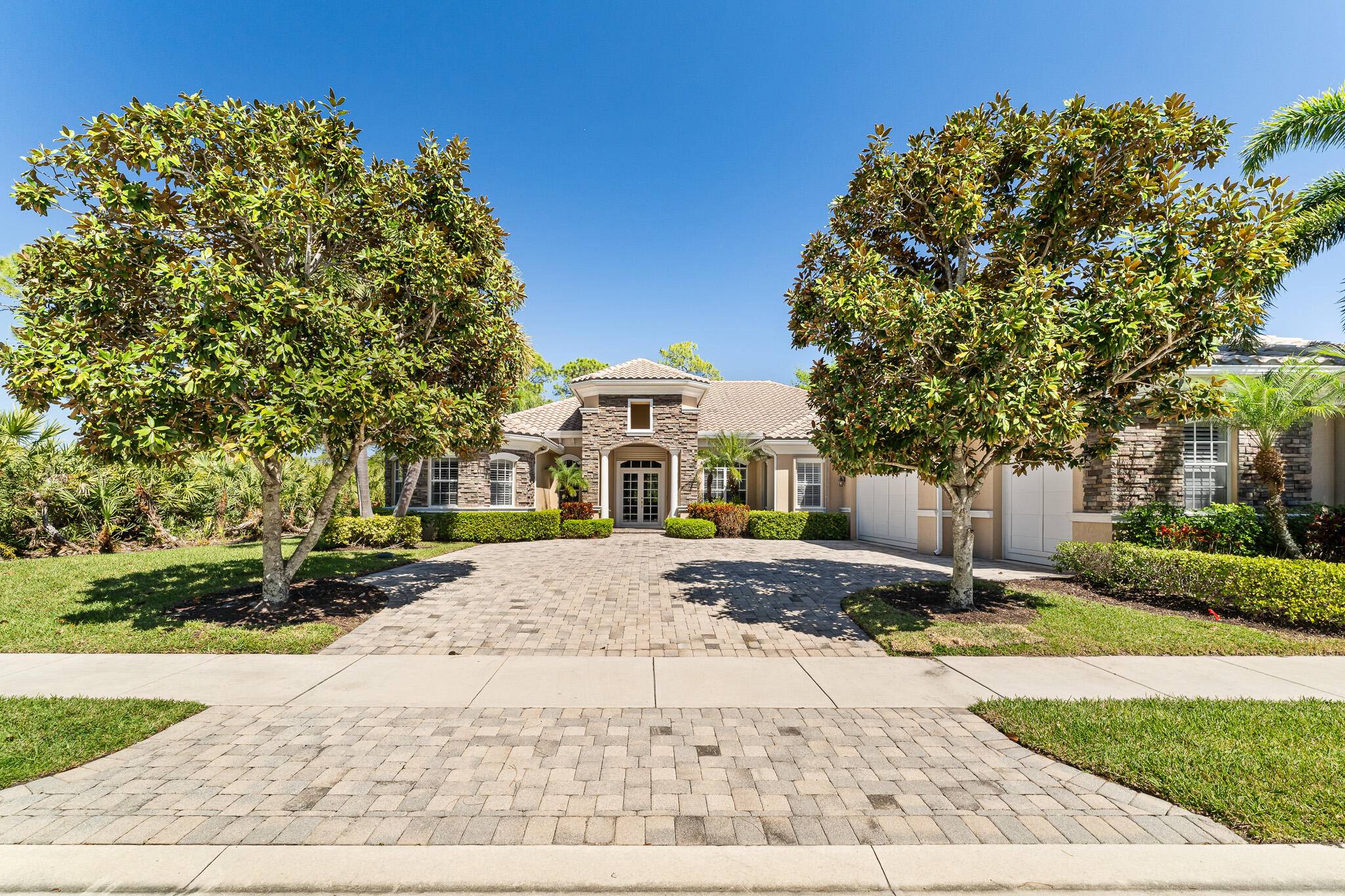 FLORIDA LIVING AT ITS BEST IN THIS EXQUISITE CUSTOM 4 BEDROOM HOME LOCATED ON THE LEGACY GOLF TENNIS CLUB IN HIGHLY DESIRABLE SCARBOROUGH ESTATES.