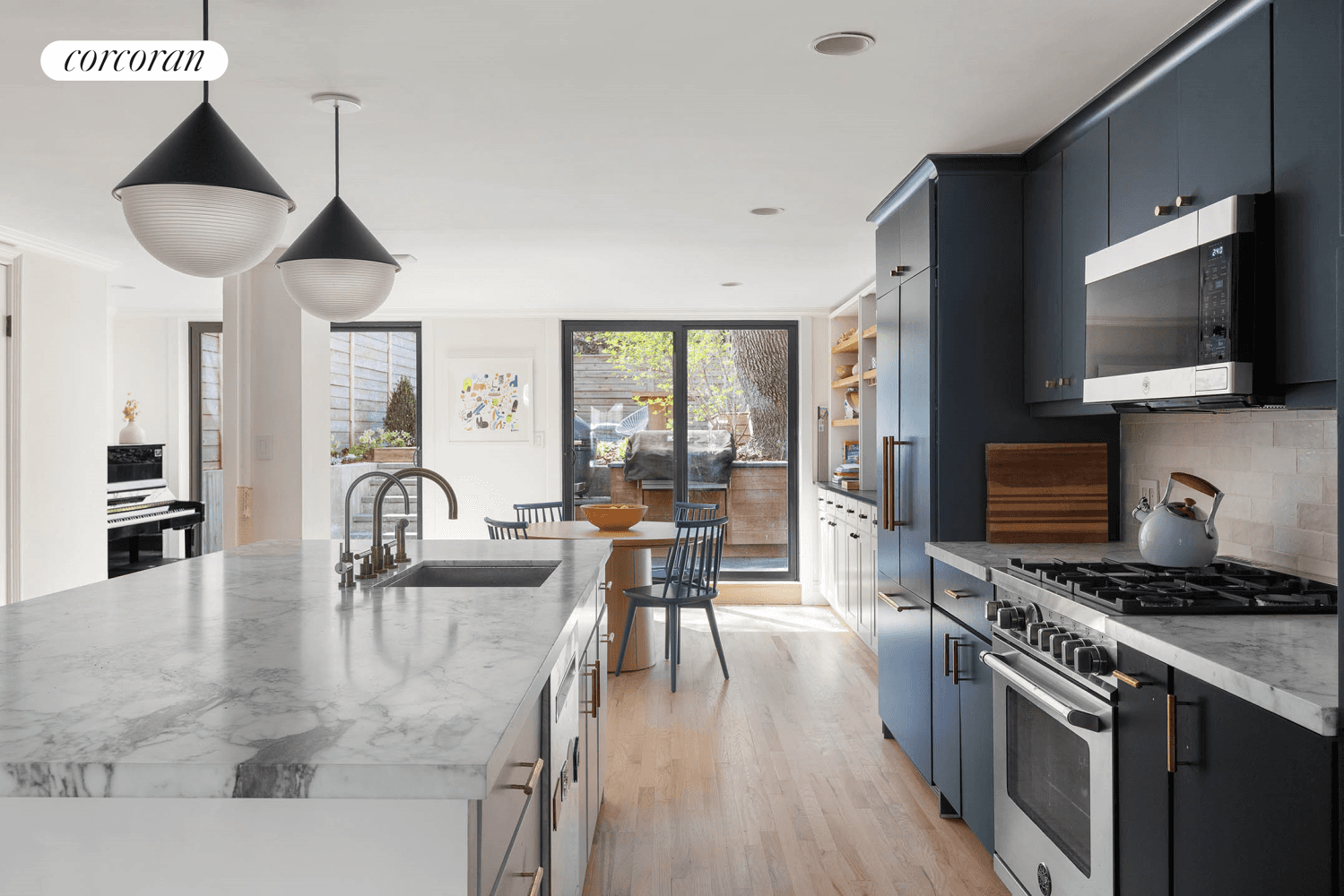 Experience luxurious living in this spacious 1, 800 SF triplex, perfectly blending modern upgrades with classic charm on a picturesque Fort Greene block.