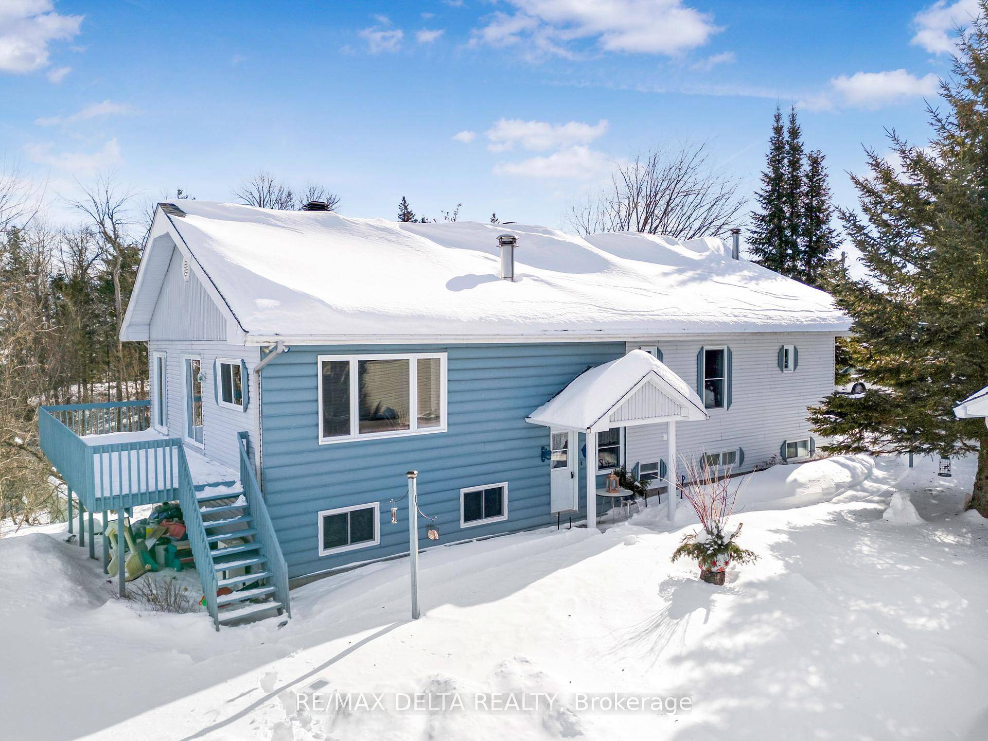 Welcome to this exceptional 1800 sq ft walk out hi ranch bungalow in Wendover, offering stunning river views and deeded water access.