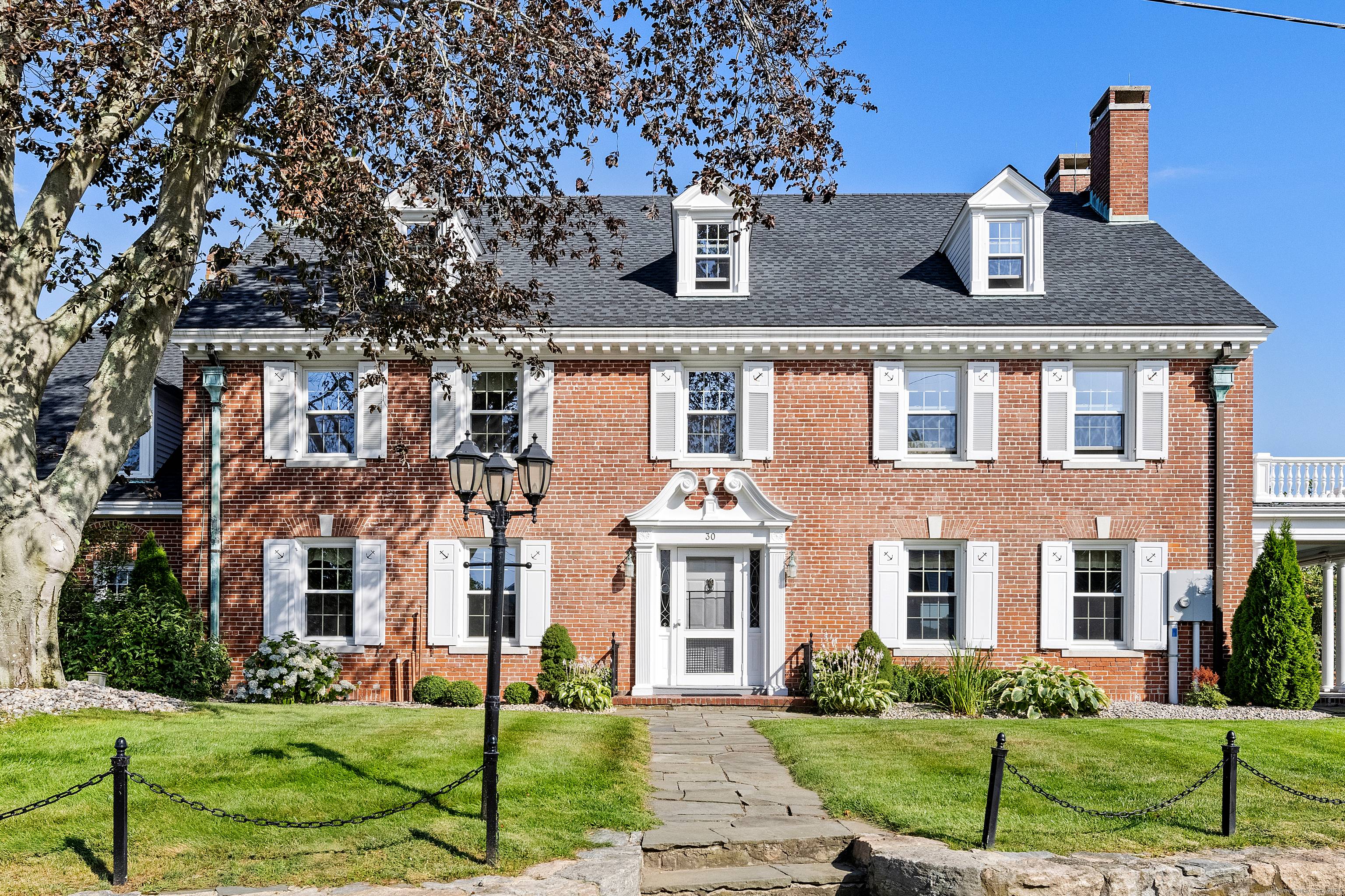 Discover The Oldfields Estate a rare masterpiece of coastal elegance nestled on the western banks of the Mystic River.