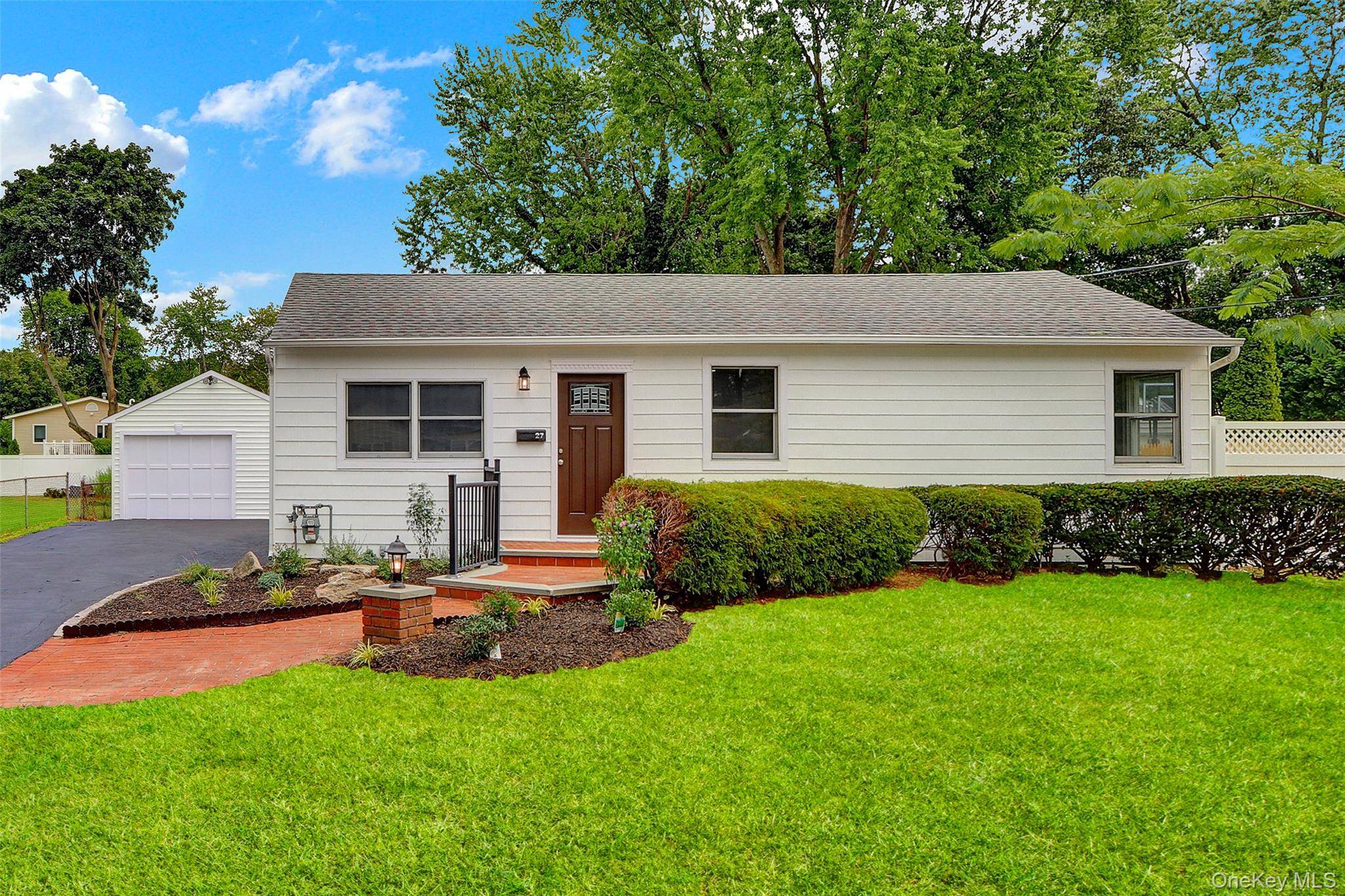 Welcome to this Beautifully Updated 3 BRs 2 Baths Expanded Ranch, Perfectly Situated in Desirable West Islip.