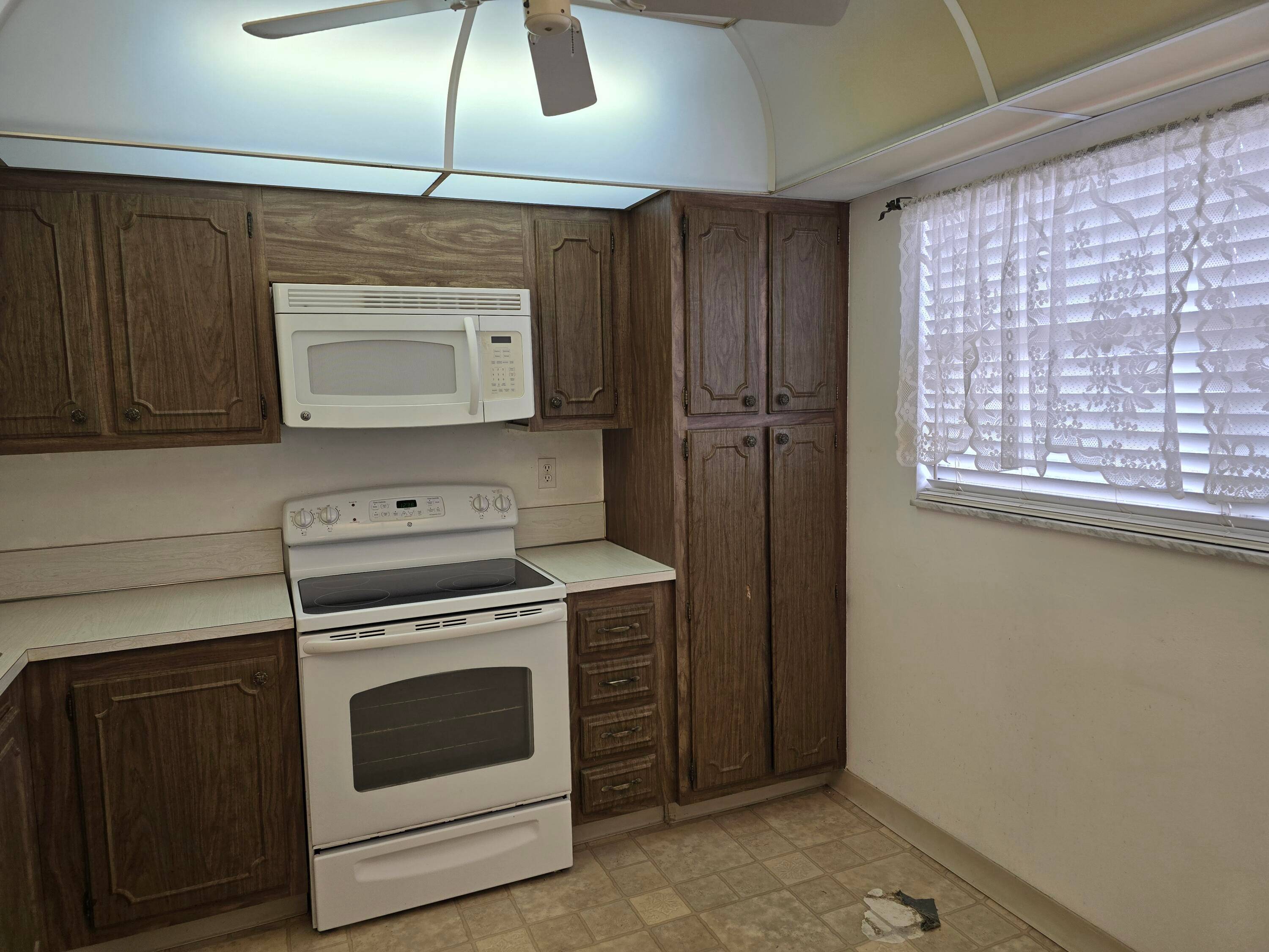 CONVENIENTLY LOCATED ACROSS FROM THE CLUBHOUSE 2 POOLS, THIS IS YOUR CHANCE TO BUY RIGHT DO IT YOUR WAY !