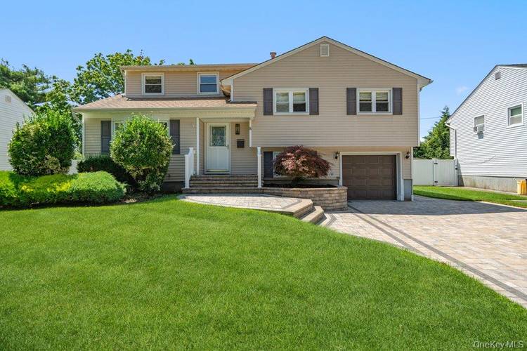 Beautiful and spacious expanded split level home nestled on a quiet cul de sac.
