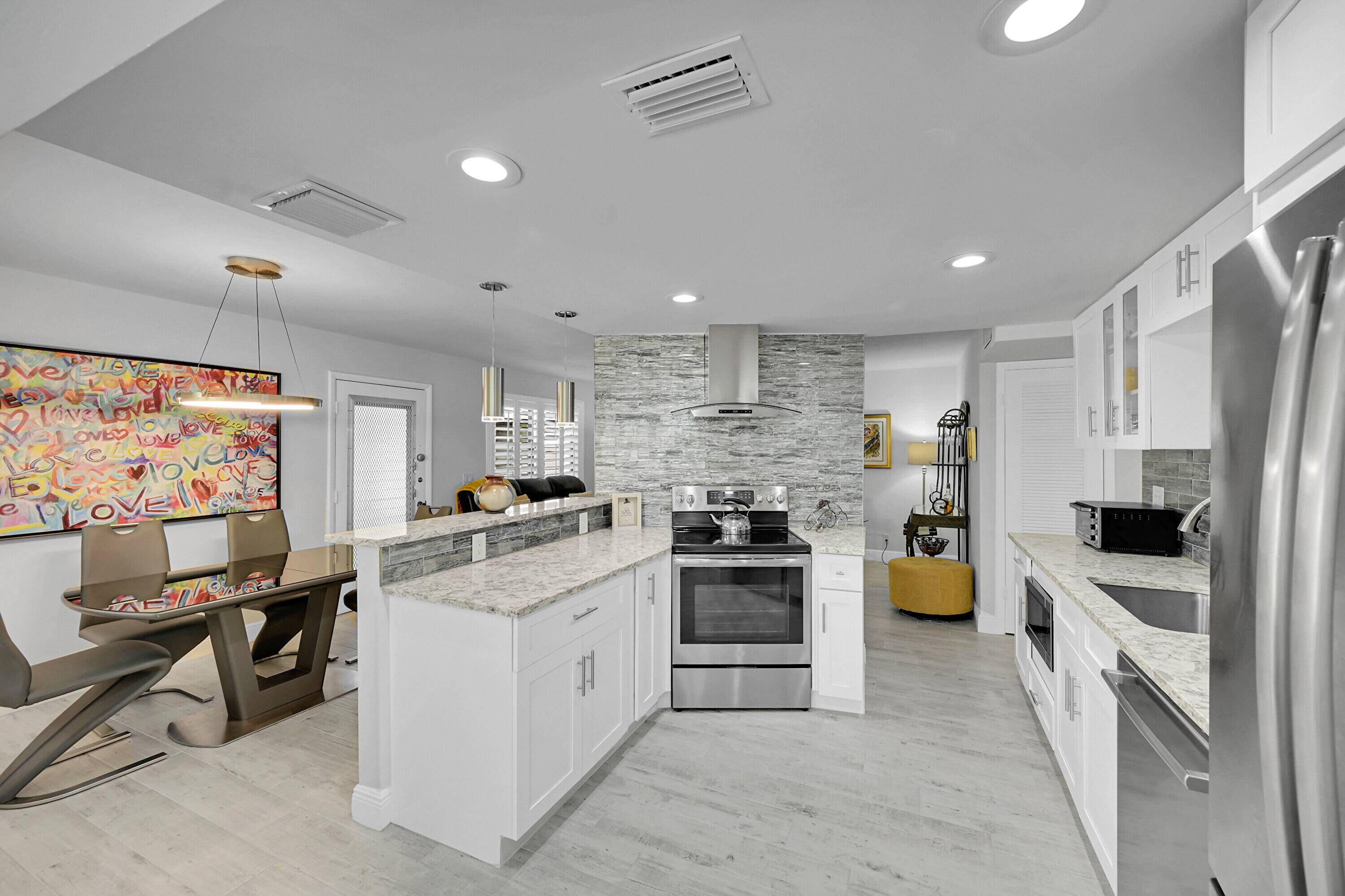 1st fl renovated 2 bed 2 bath corner luxury condo is the most beautiful condo in Kings Point.