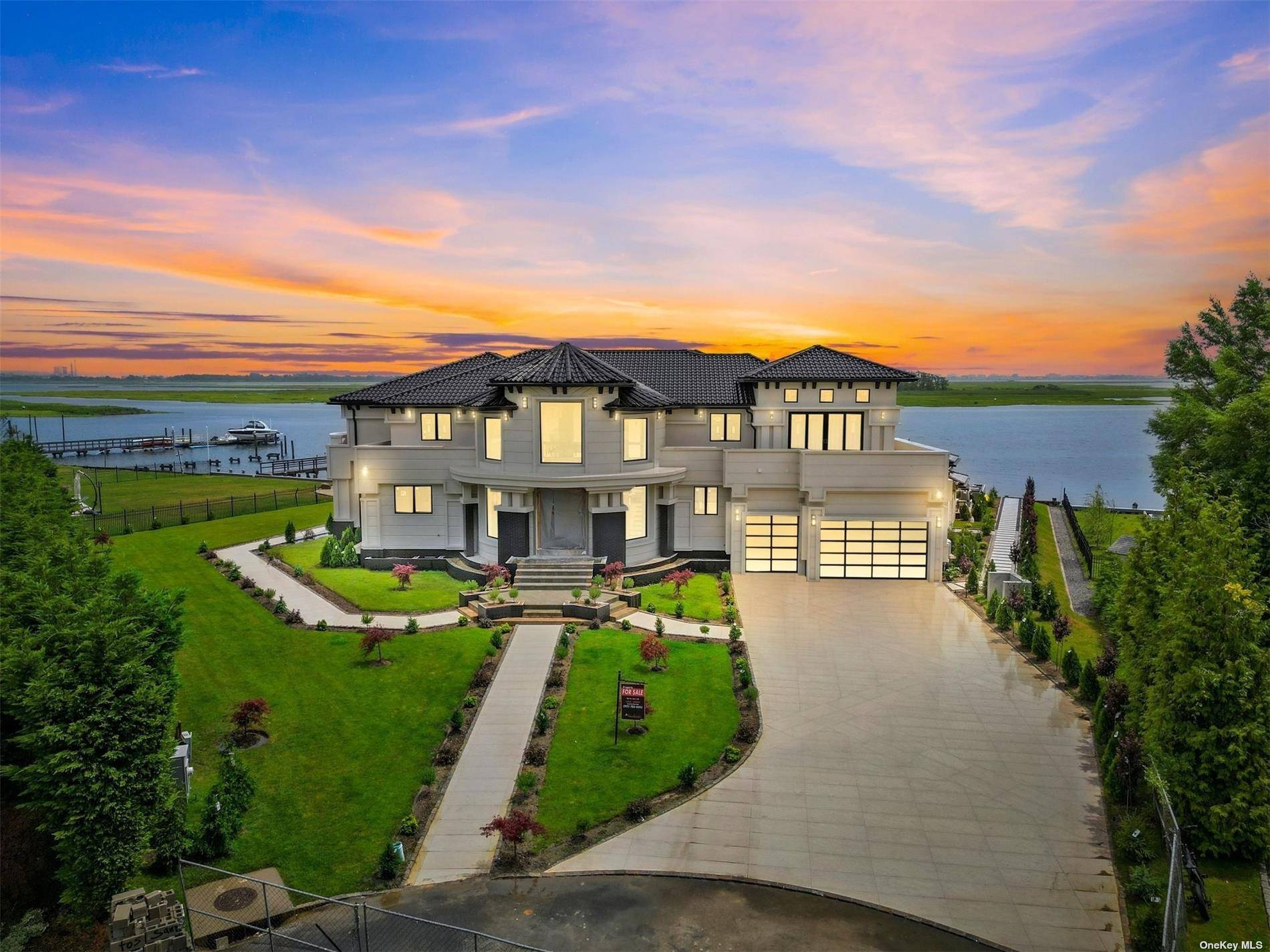 Mega Waterfront Mansion Featuring Mega Waterfront Mansion.