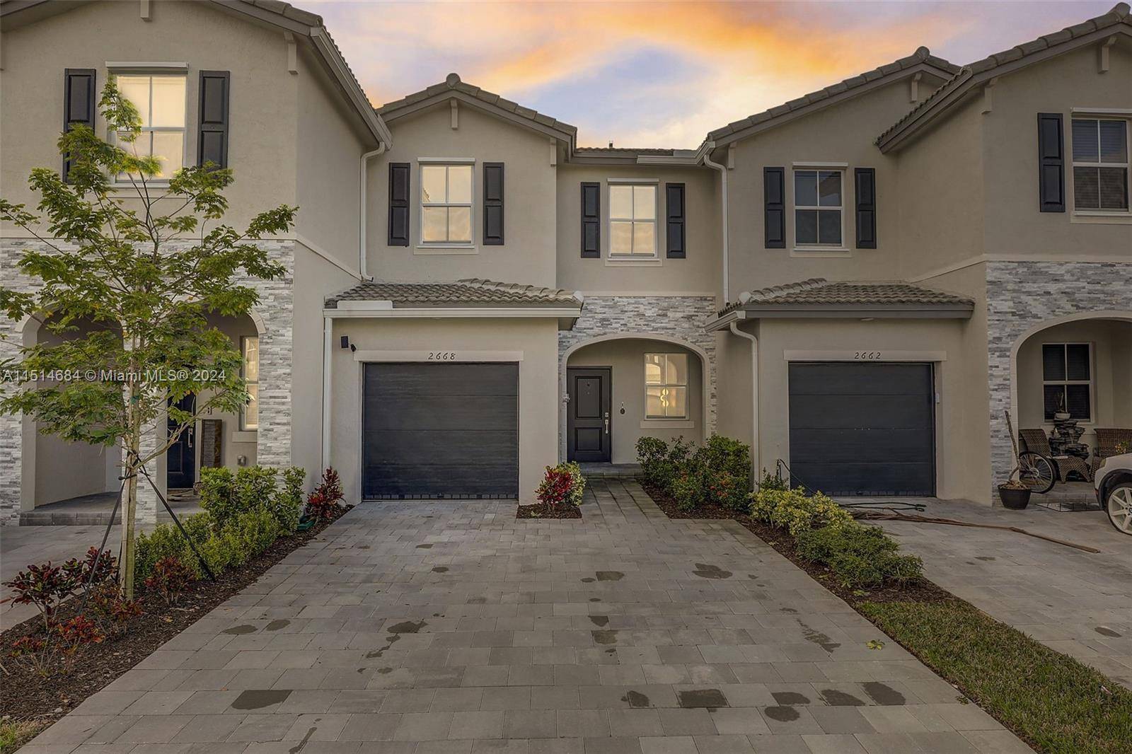 Stunning new construction townhome features 3 bedrooms and 2.
