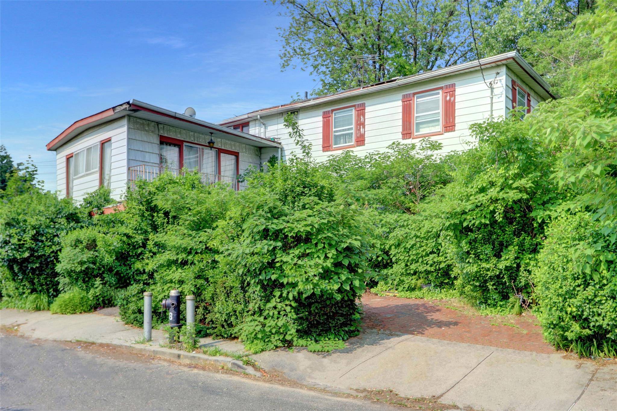 Colonial Style Home. This Home Features 4 Bedrooms, 2.