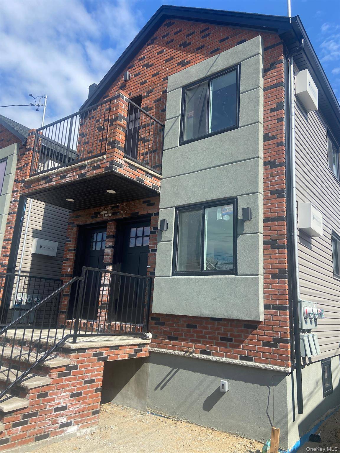Introducing 121 11 195th St, a newly constructed two family home offering approximately 2, 500 sq ft of living space, nestled on a serene, tree lined block.