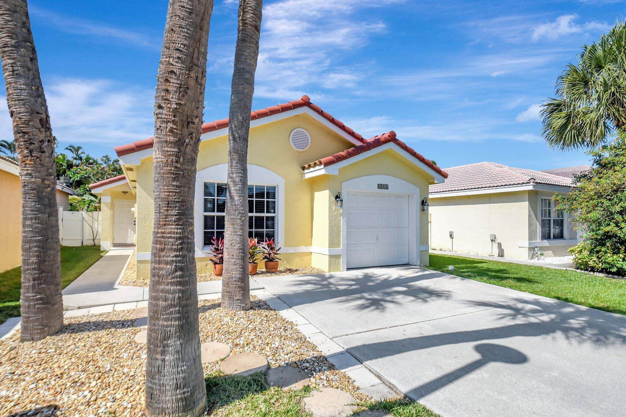 You'll love living in the gated community of Nautica in this beautiful, well cared for home with NEW barrel tile roof 2024, IMPACT GLASS for storm protection and newer appliances.