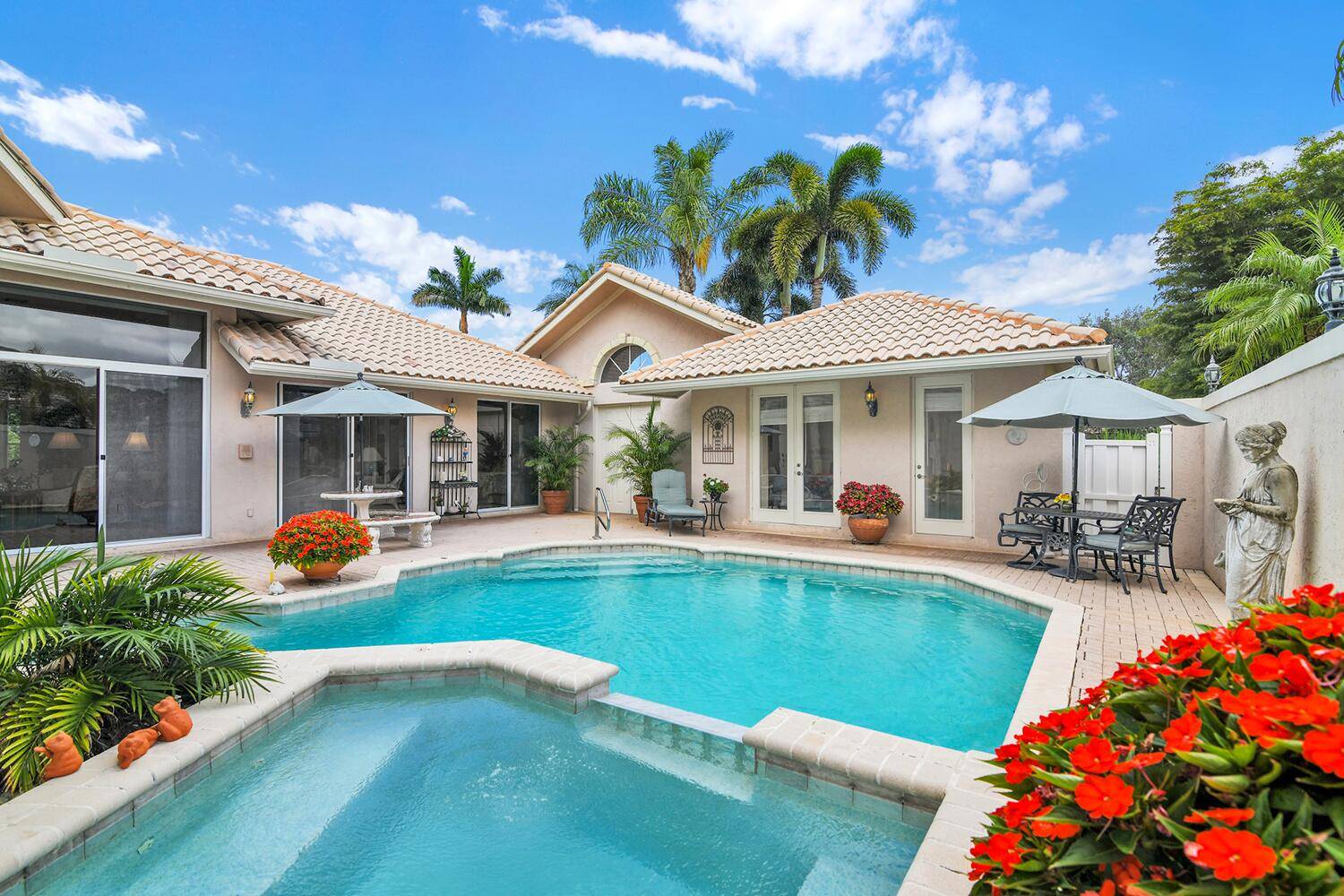 4 Bedroom, 3 bath home with private courtyard pool located in the Pine Tree Golf Club gated community with NO mandatory membership fees !
